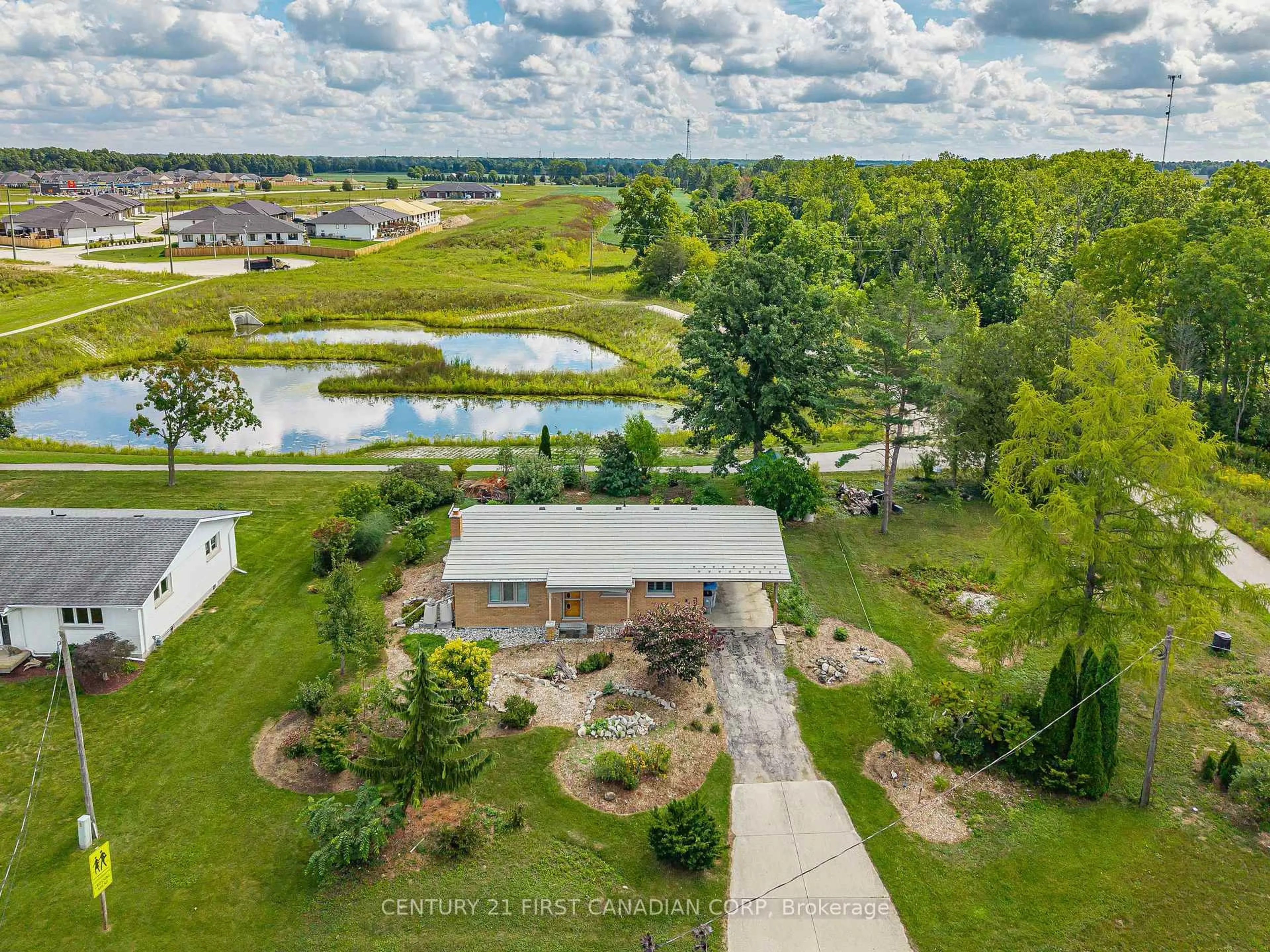 A pic from outside/outdoor area/front of a property/back of a property/a pic from drone, water/lake/river/ocean view for 52 Gill Rd, Lambton Shores Ontario N0M 1T0