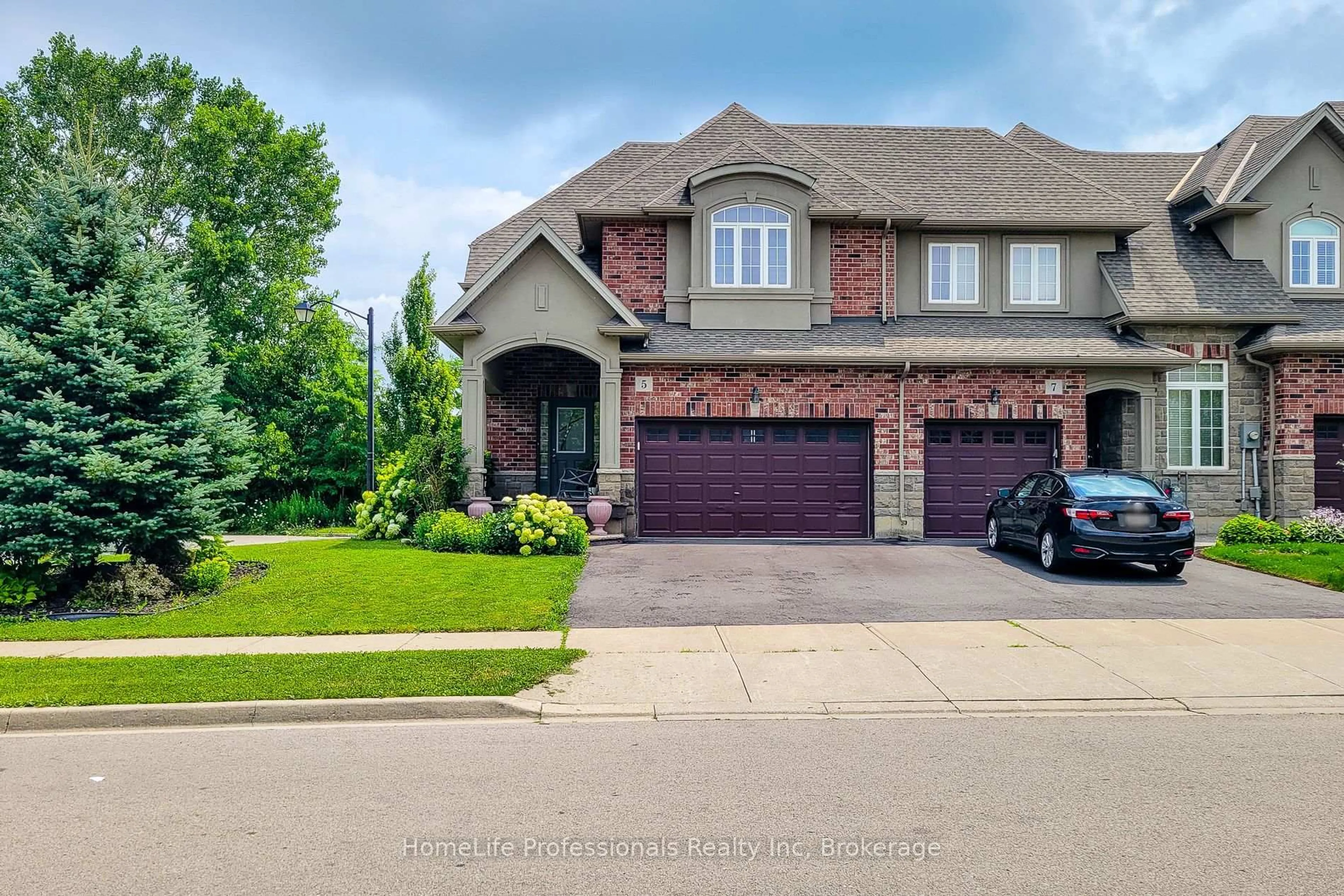 Home with brick exterior material, street for 5 Medici Lane, Hamilton Ontario L9B 0C8