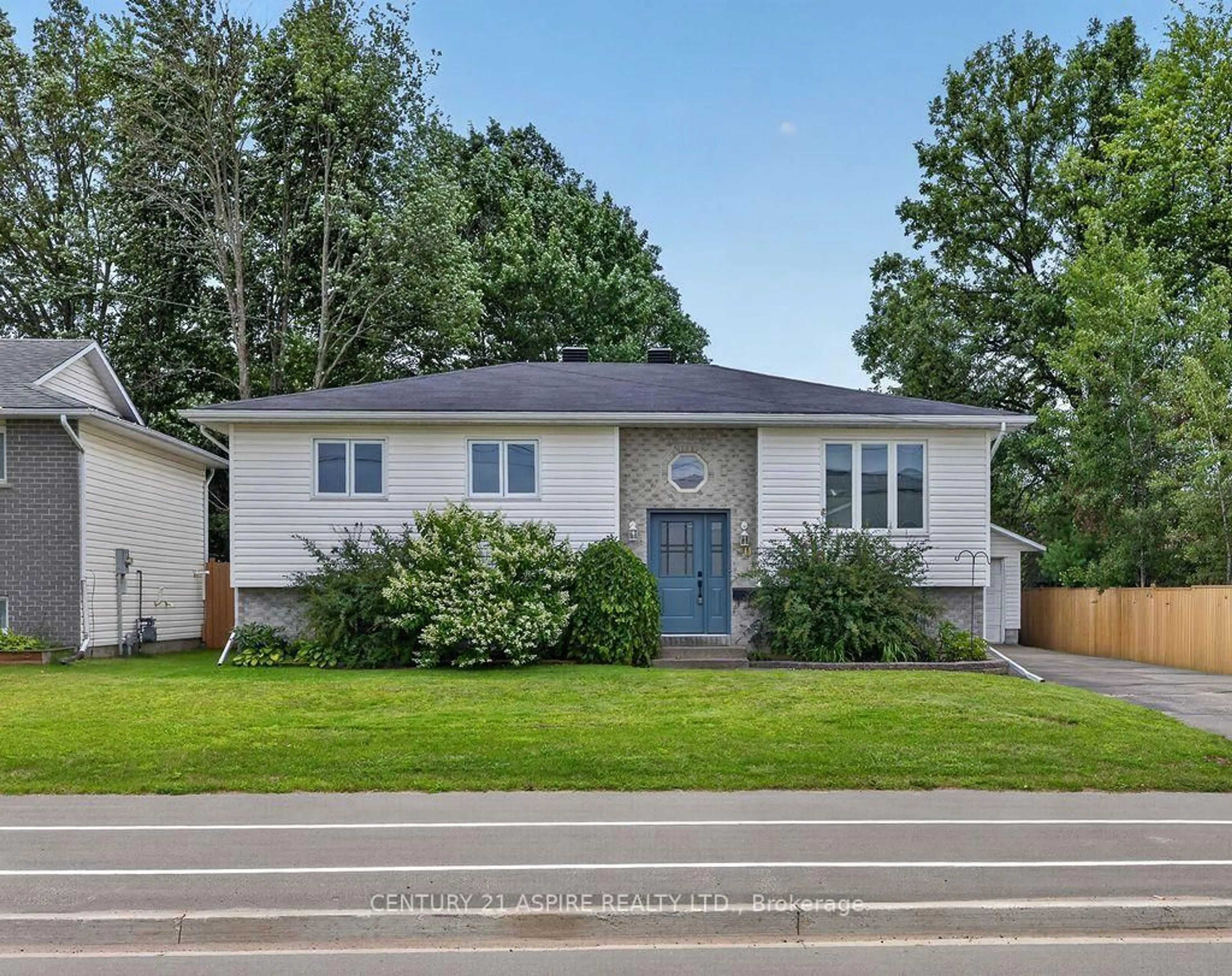 Home with vinyl exterior material, street for 50 Portage Rd, Petawawa Ontario K8H 3M8