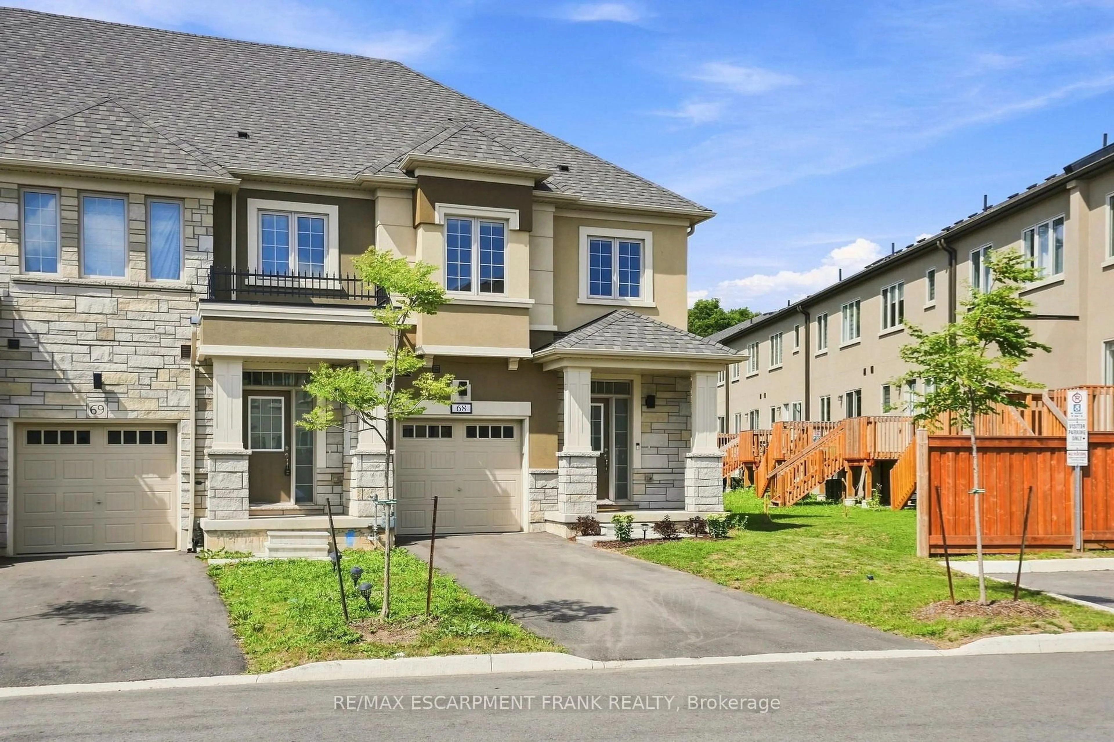 Home with brick exterior material, street for 305 Garner Rd #68, Hamilton Ontario L9G 3K9
