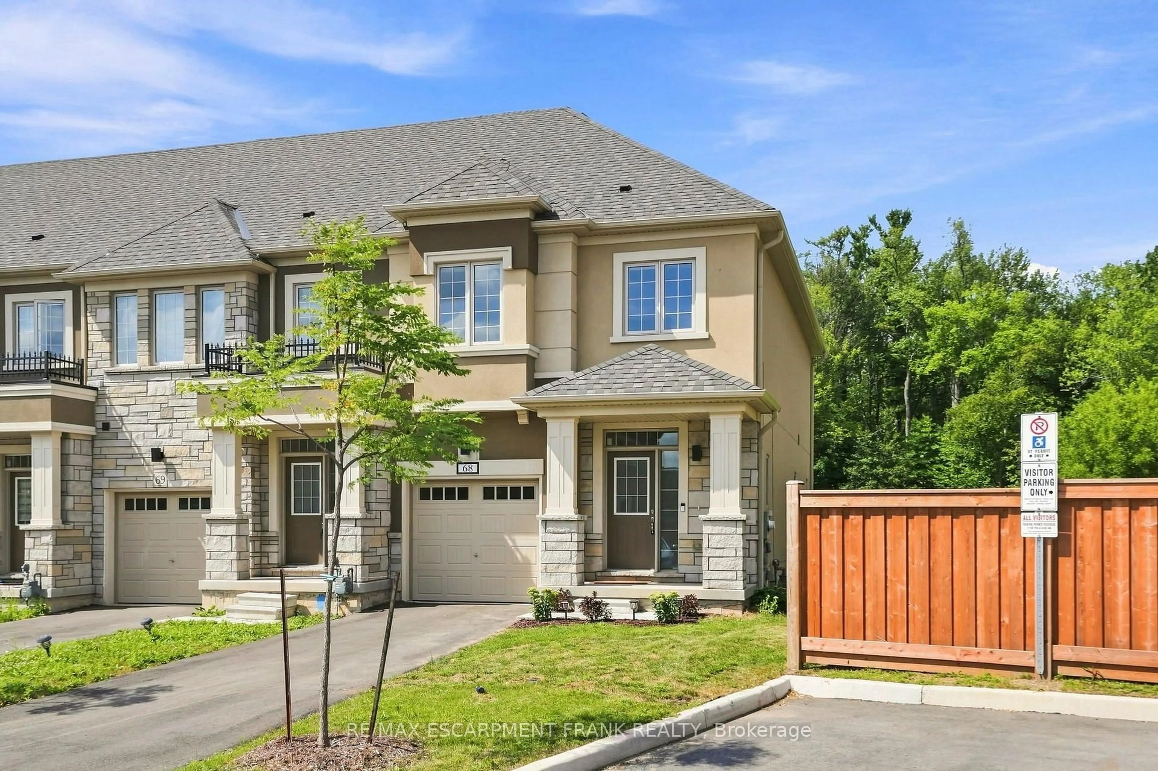 Home with brick exterior material, street for 305 Garner Rd #68, Hamilton Ontario L9G 3K9
