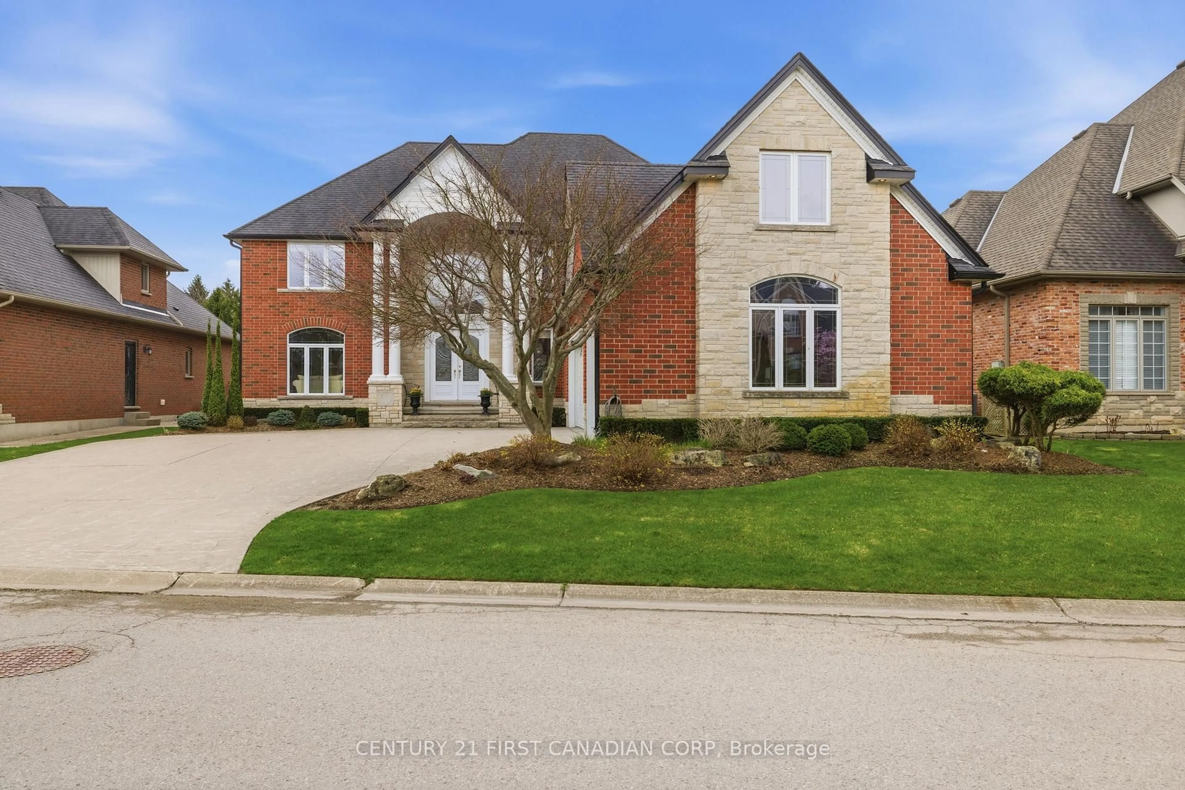 Home with brick exterior material, street for 7222 Clayton Walk #2, London South Ontario N6P 1W1