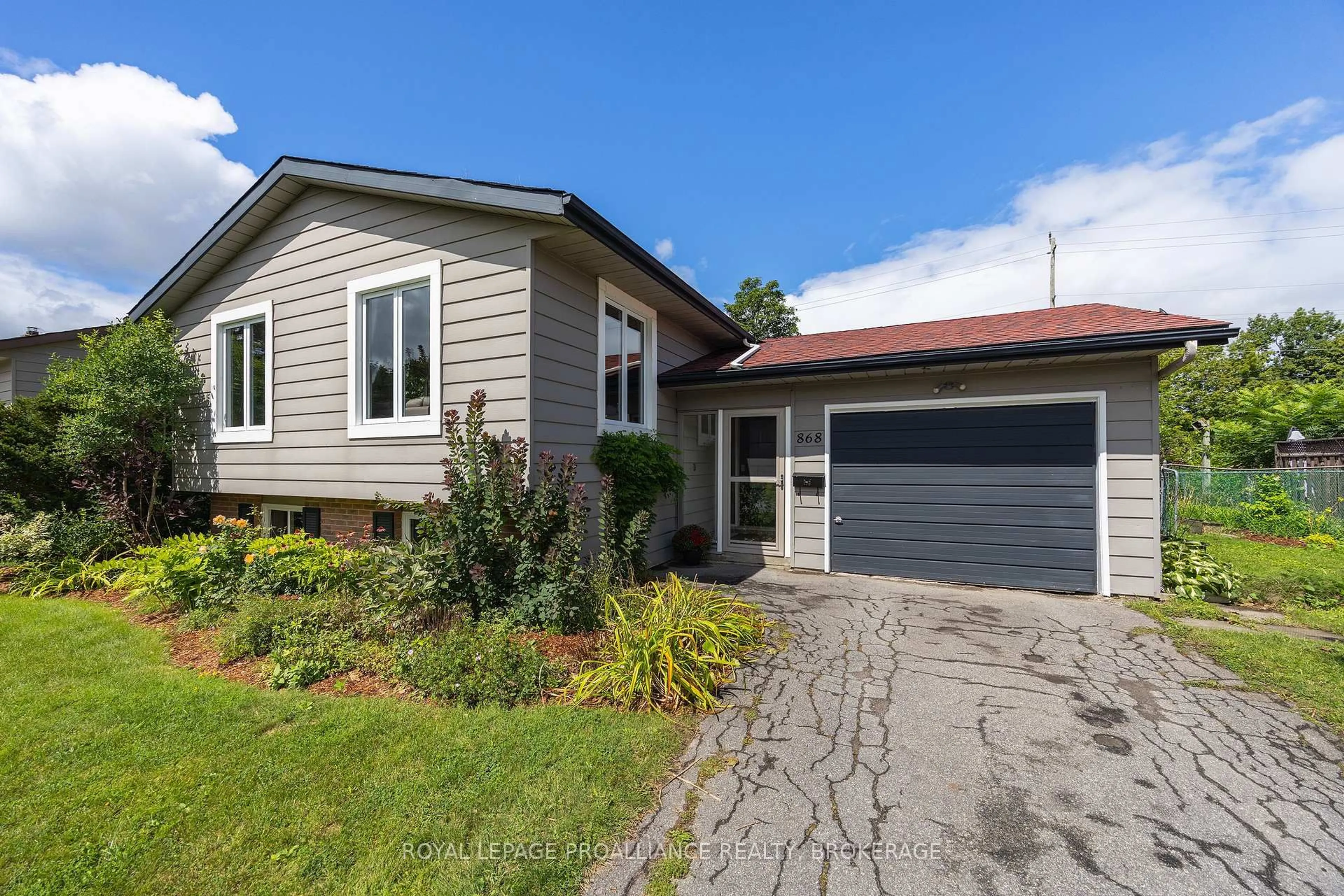 Home with vinyl exterior material, street for 868 Allum Ave, Kingston Ontario K7M 7A1