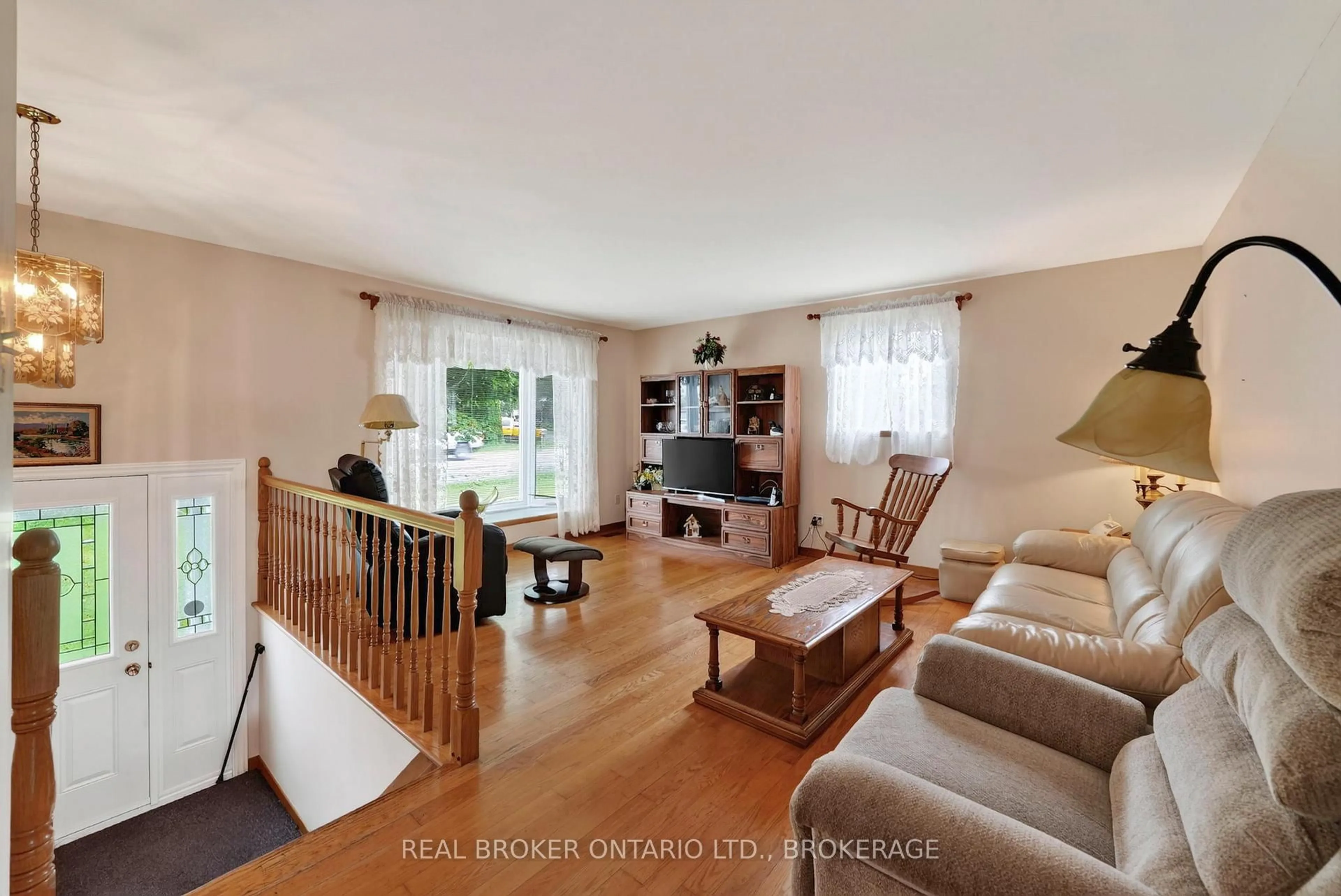 Living room with furniture, wood/laminate floor for 17550 Island Rd, South Stormont Ontario K0C 1S0