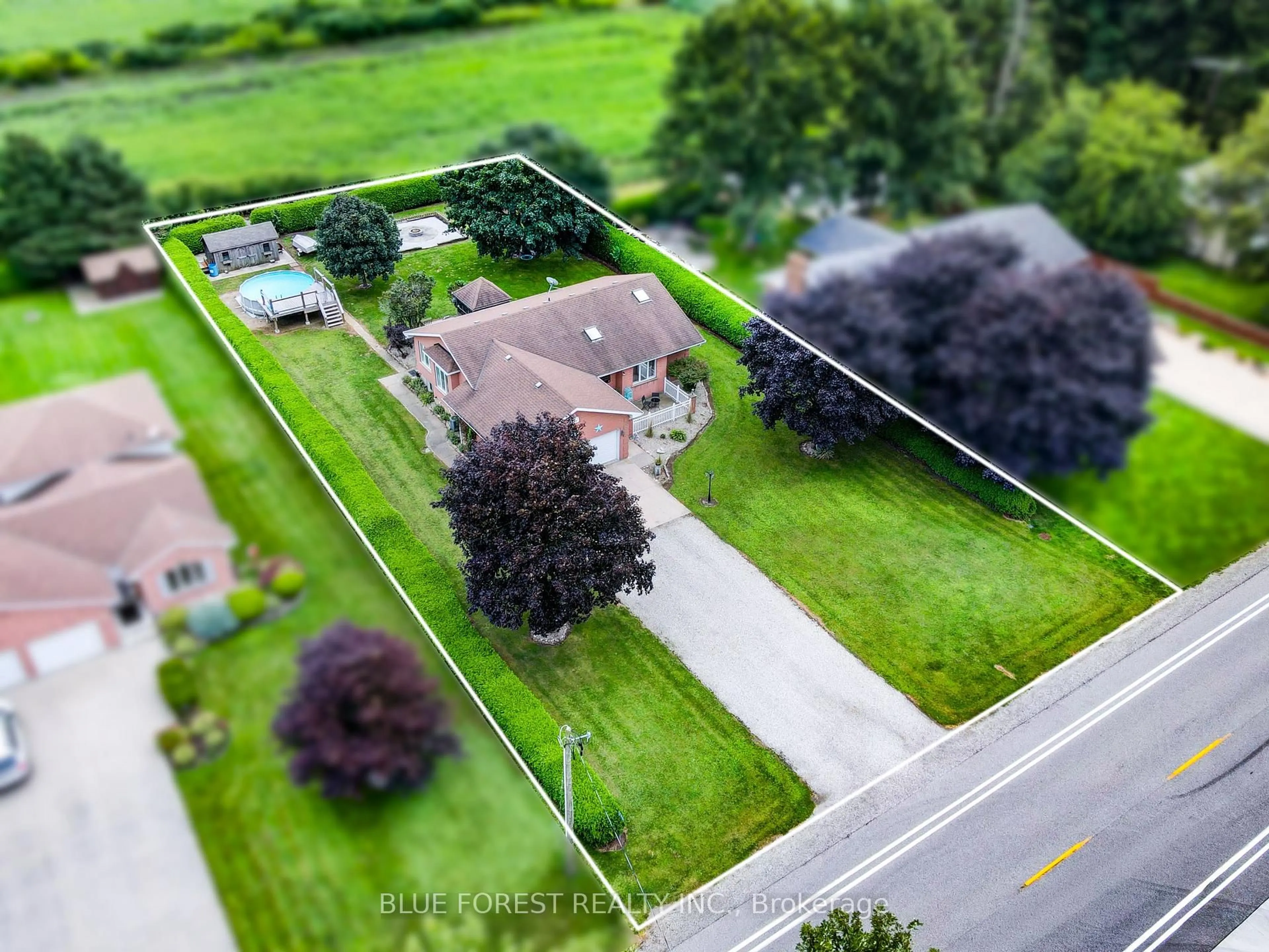 A pic from outside/outdoor area/front of a property/back of a property/a pic from drone, street for 23081 PIONEER Line, West Elgin Ontario N0L 2C0