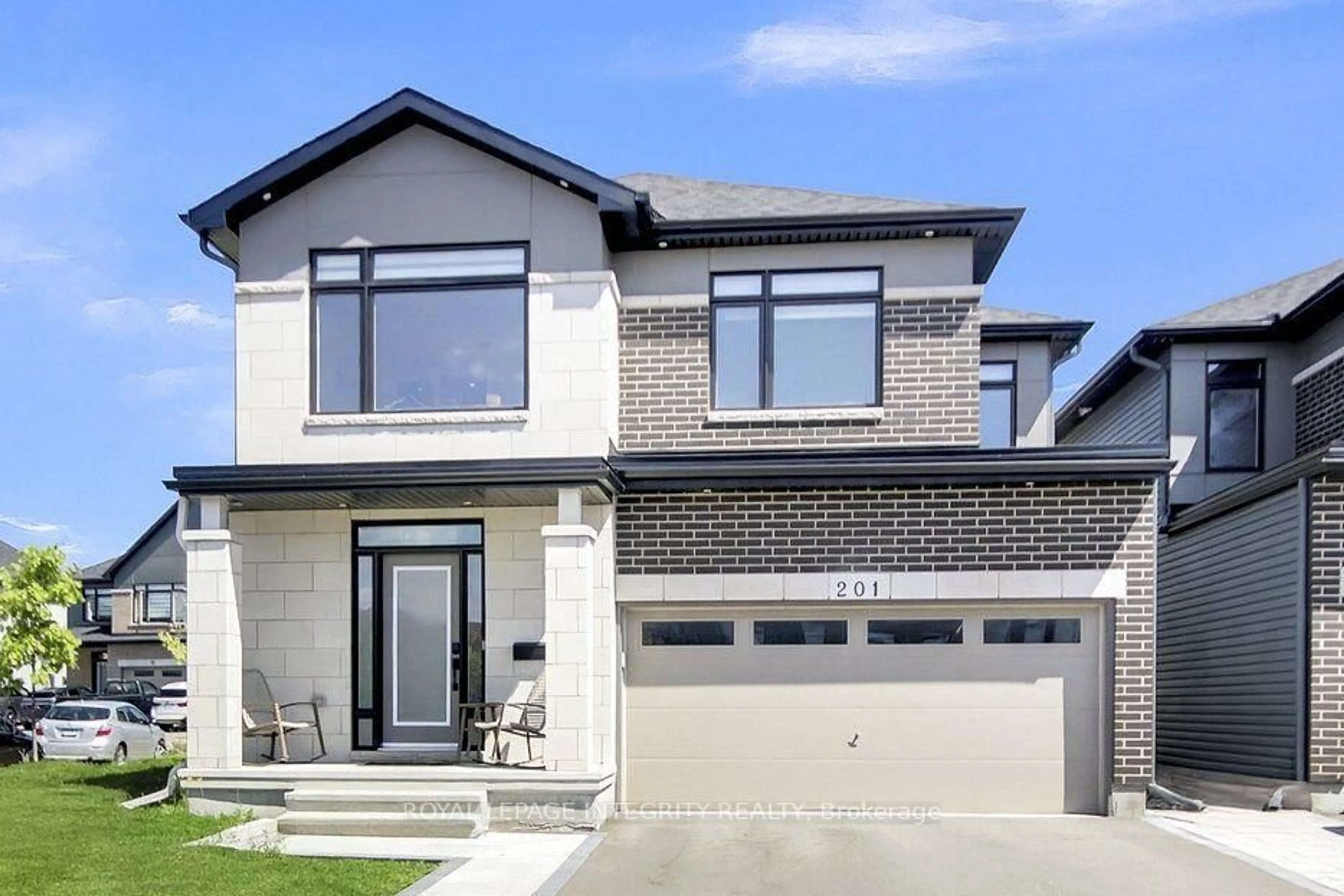 Home with brick exterior material, street for 201 Reisling Way, Ottawa Ontario K1T 0X1