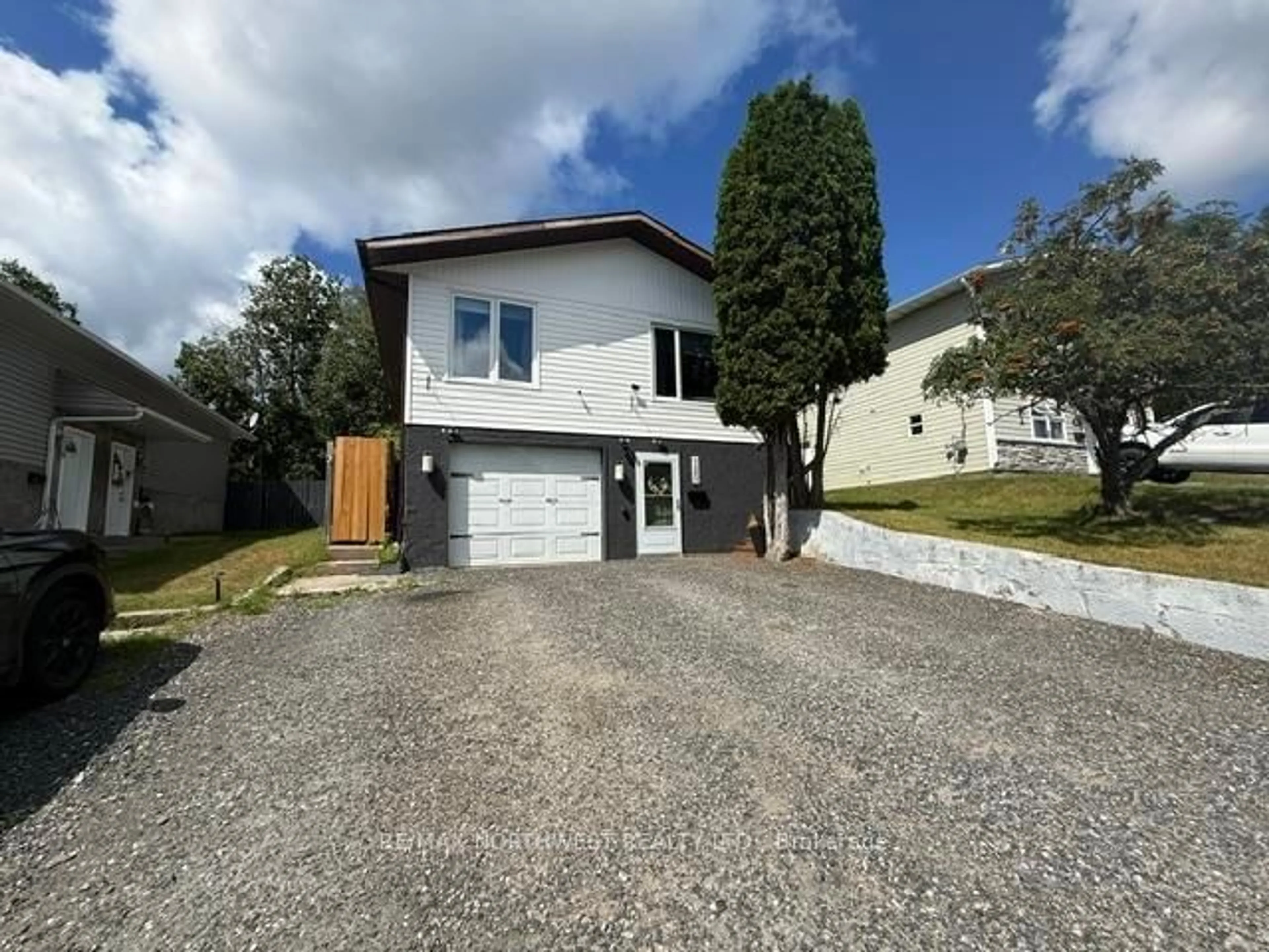 A pic from outside/outdoor area/front of a property/back of a property/a pic from drone, street for 120 Minto Cres, Kenora Ontario P9N 3K2