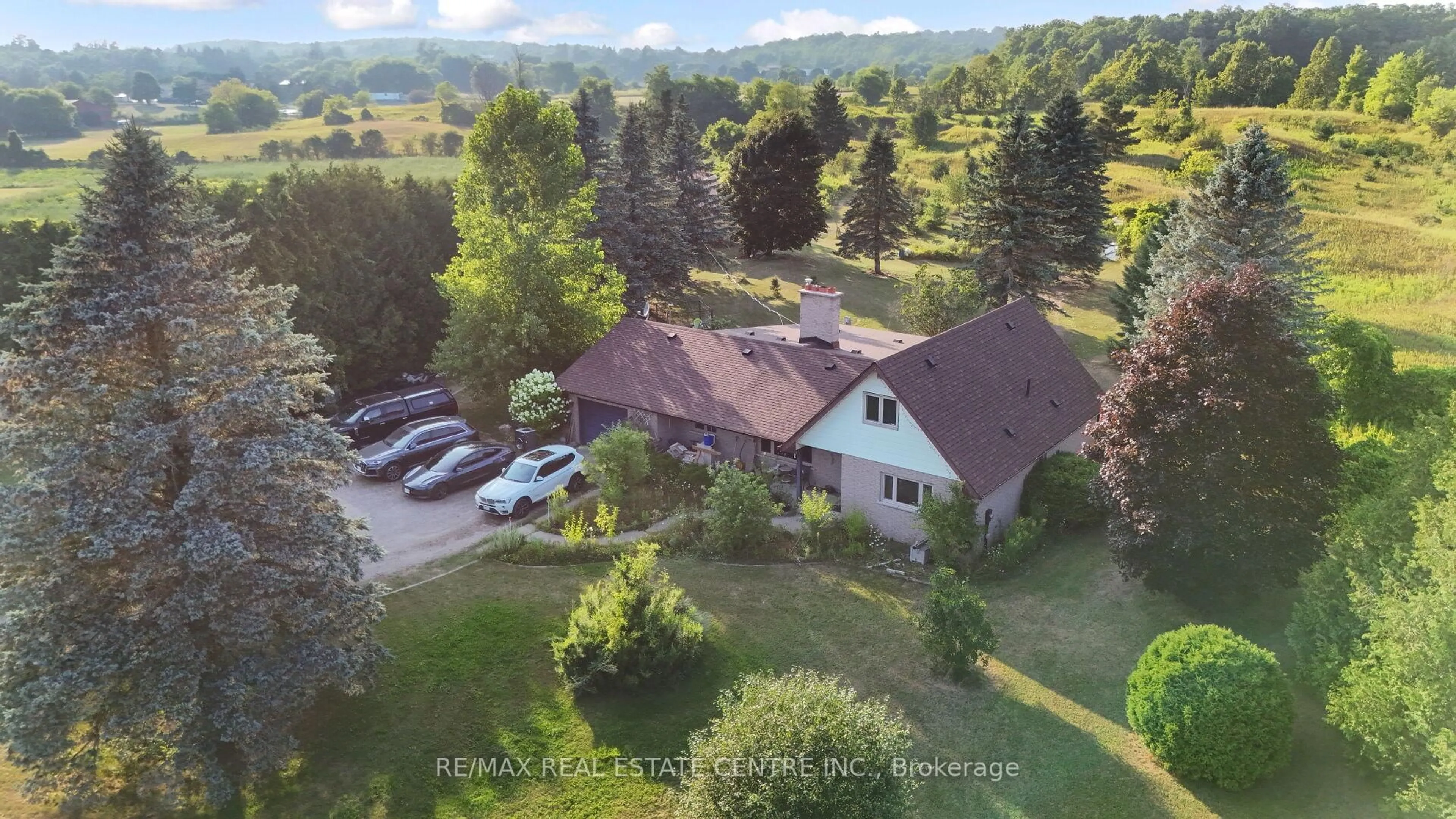 A pic from outside/outdoor area/front of a property/back of a property/a pic from drone, mountain view for 8438 HWY 7, Guelph/Eramosa Ontario N0B 2K0