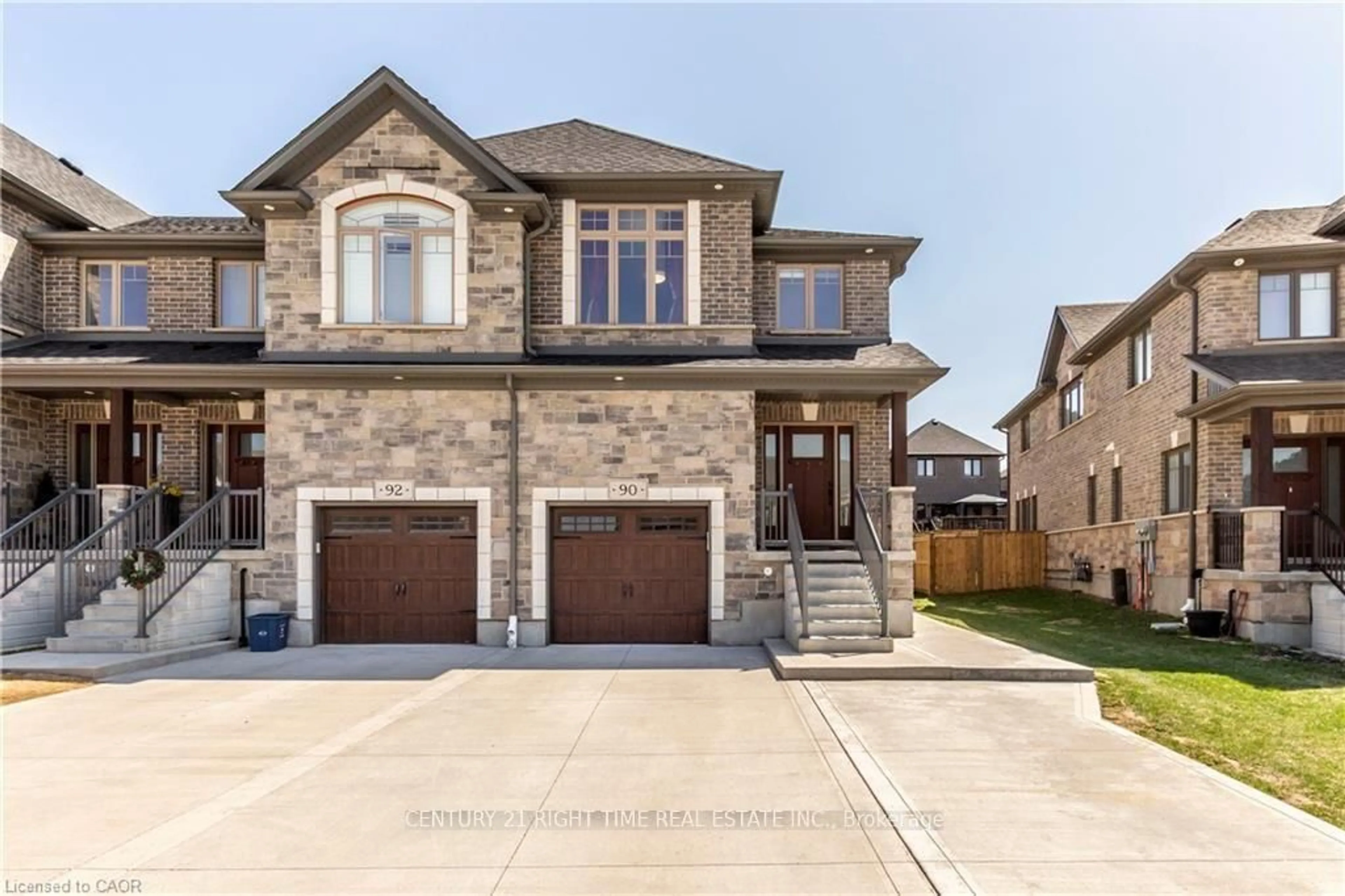 Home with brick exterior material, street for 90 Hollybrook Tr, Kitchener Ontario N2R 0M7