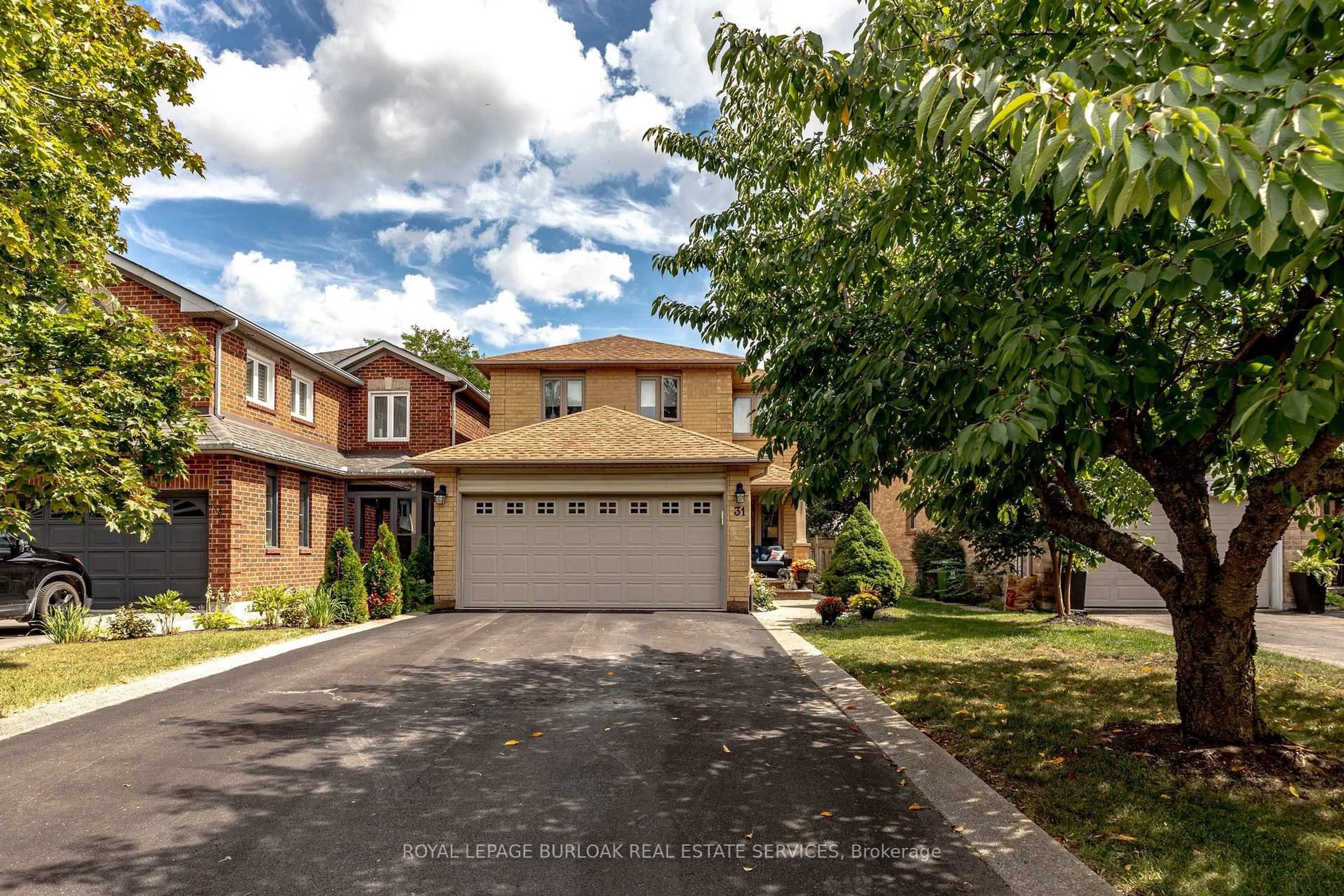 Home with brick exterior material, street for 31 Grindstone Way, Hamilton Ontario L9H 7B7