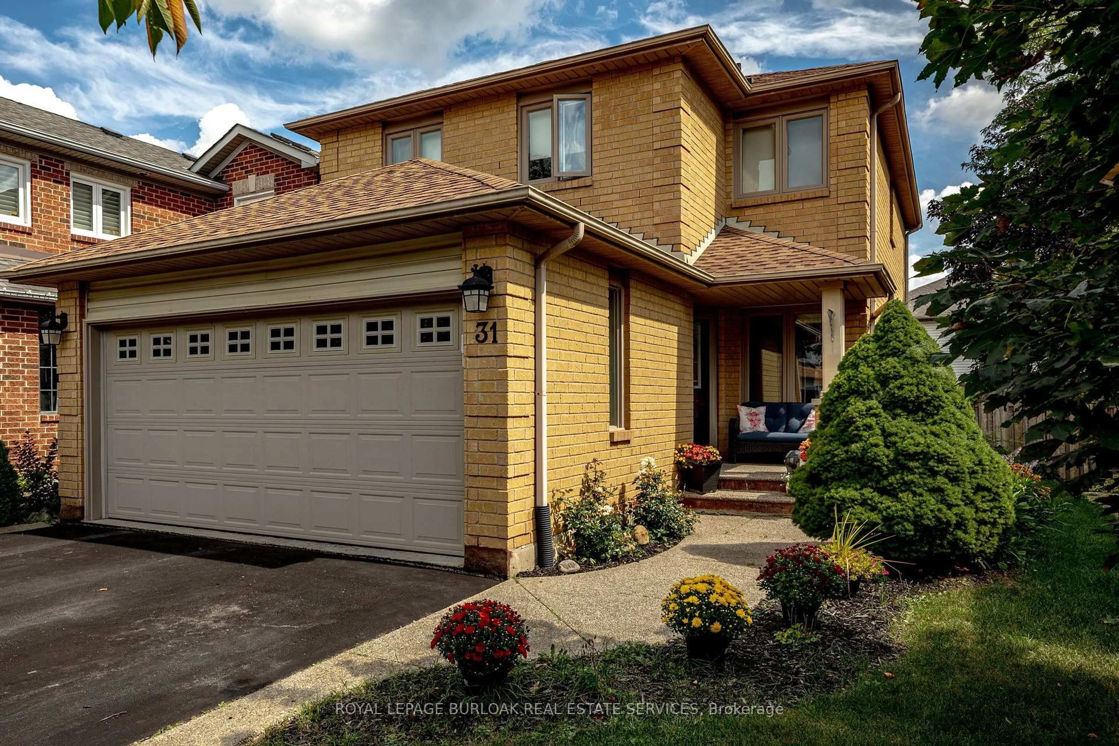 Home with brick exterior material, street for 31 Grindstone Way, Hamilton Ontario L9H 7B7