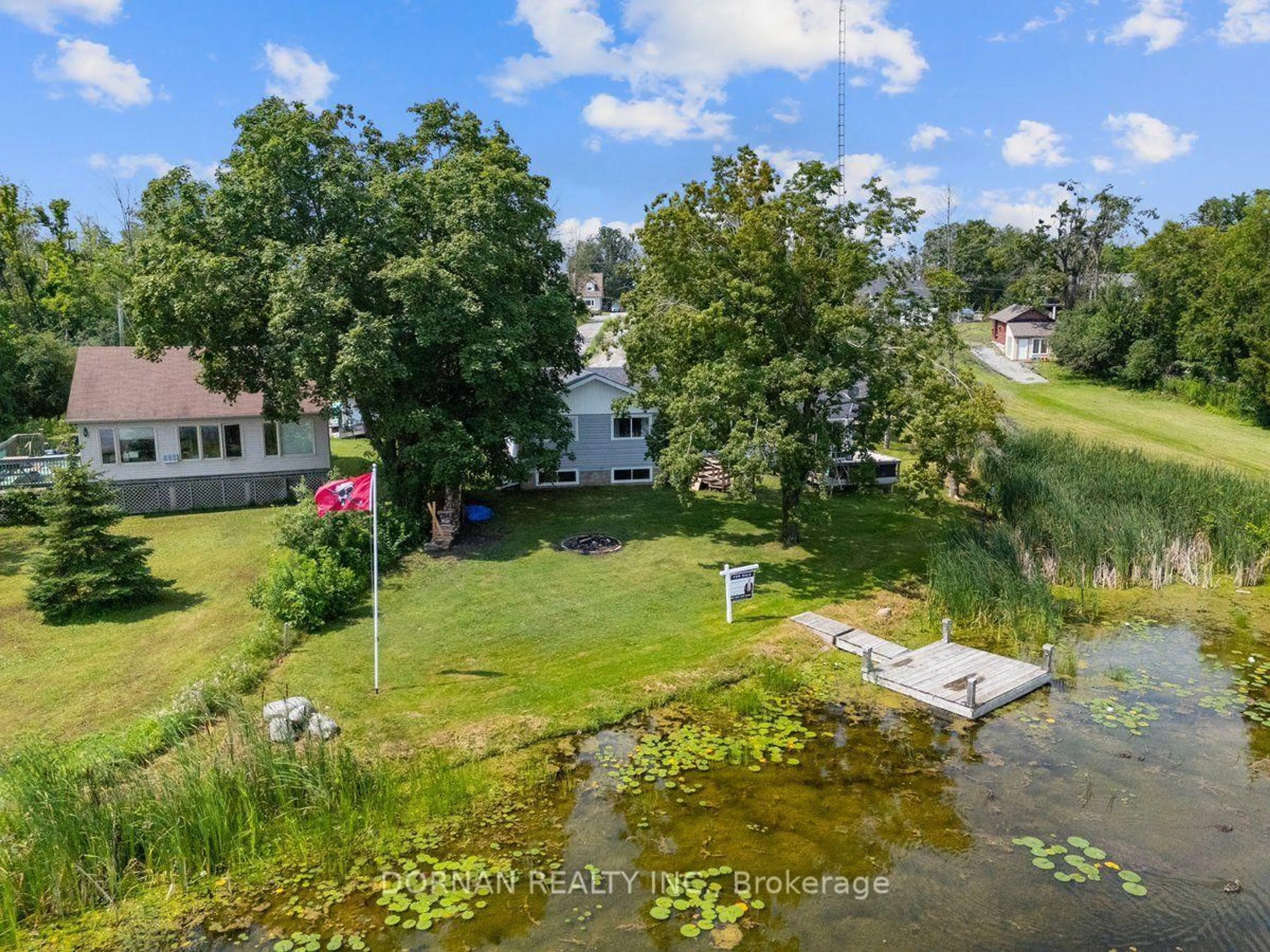 A pic from outside/outdoor area/front of a property/back of a property/a pic from drone, water/lake/river/ocean view for 24 Butternut Dr, Kawartha Lakes Ontario K9V 4R1
