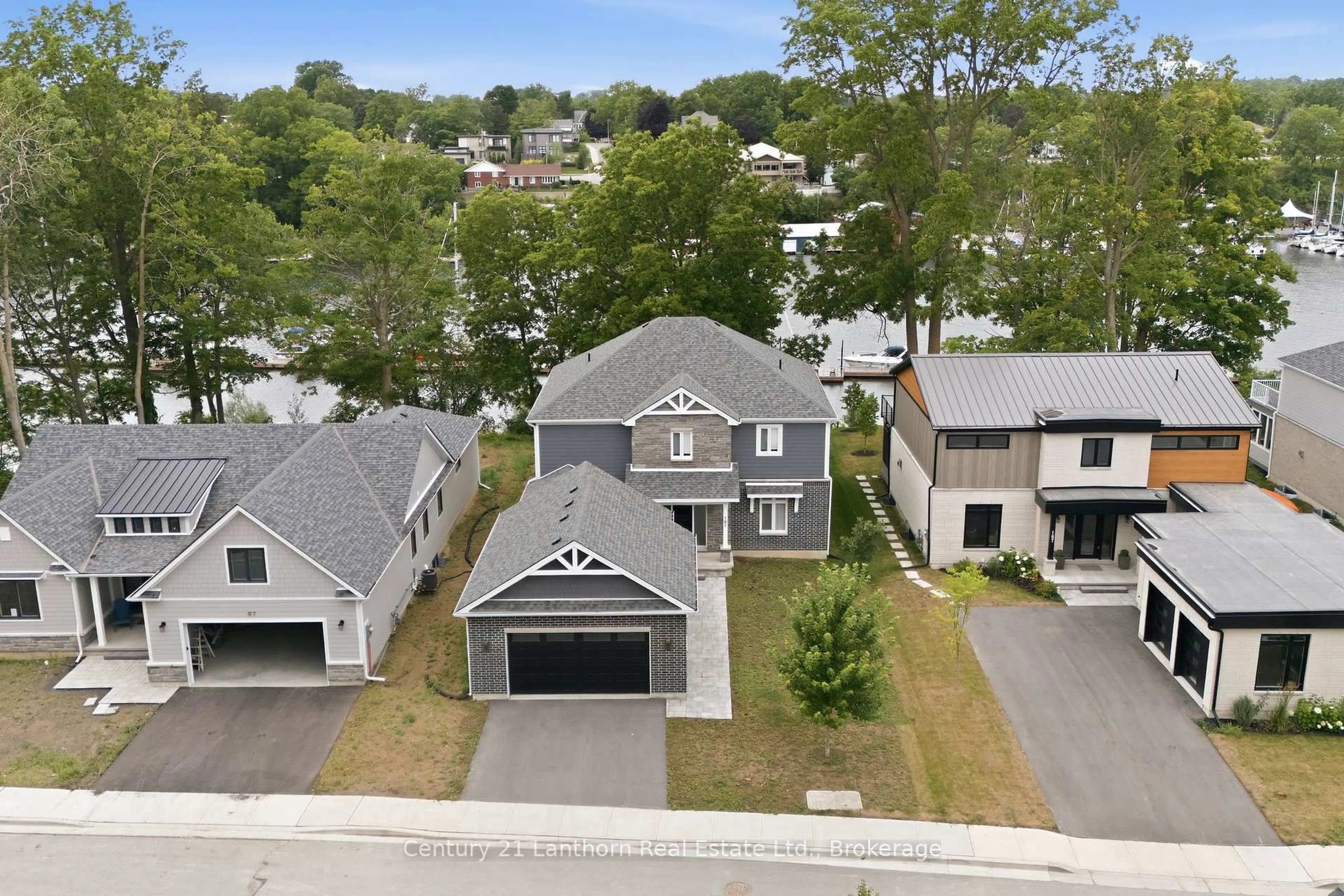 A pic from outside/outdoor area/front of a property/back of a property/a pic from drone, street for 101 VILLENEUVE Dr, Prince Edward County Ontario K0K 2T0