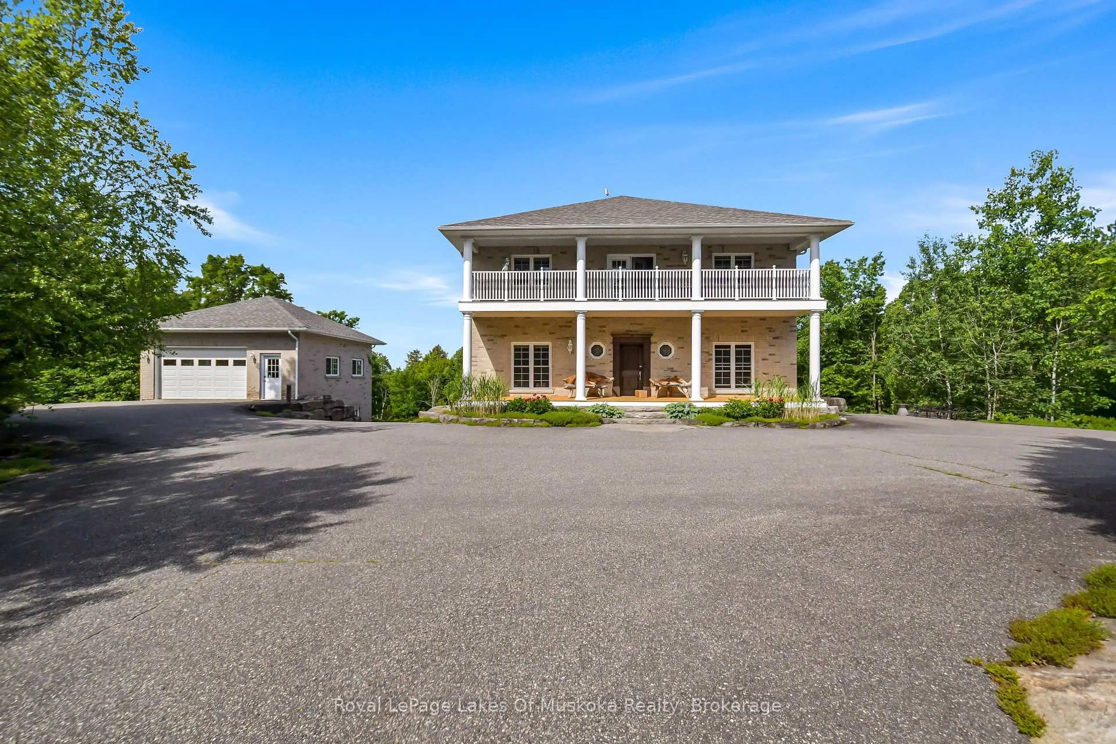 A pic from outside/outdoor area/front of a property/back of a property/a pic from drone, water/lake/river/ocean view for 1039 Ziska Rd, Bracebridge Ontario P1L 1W8