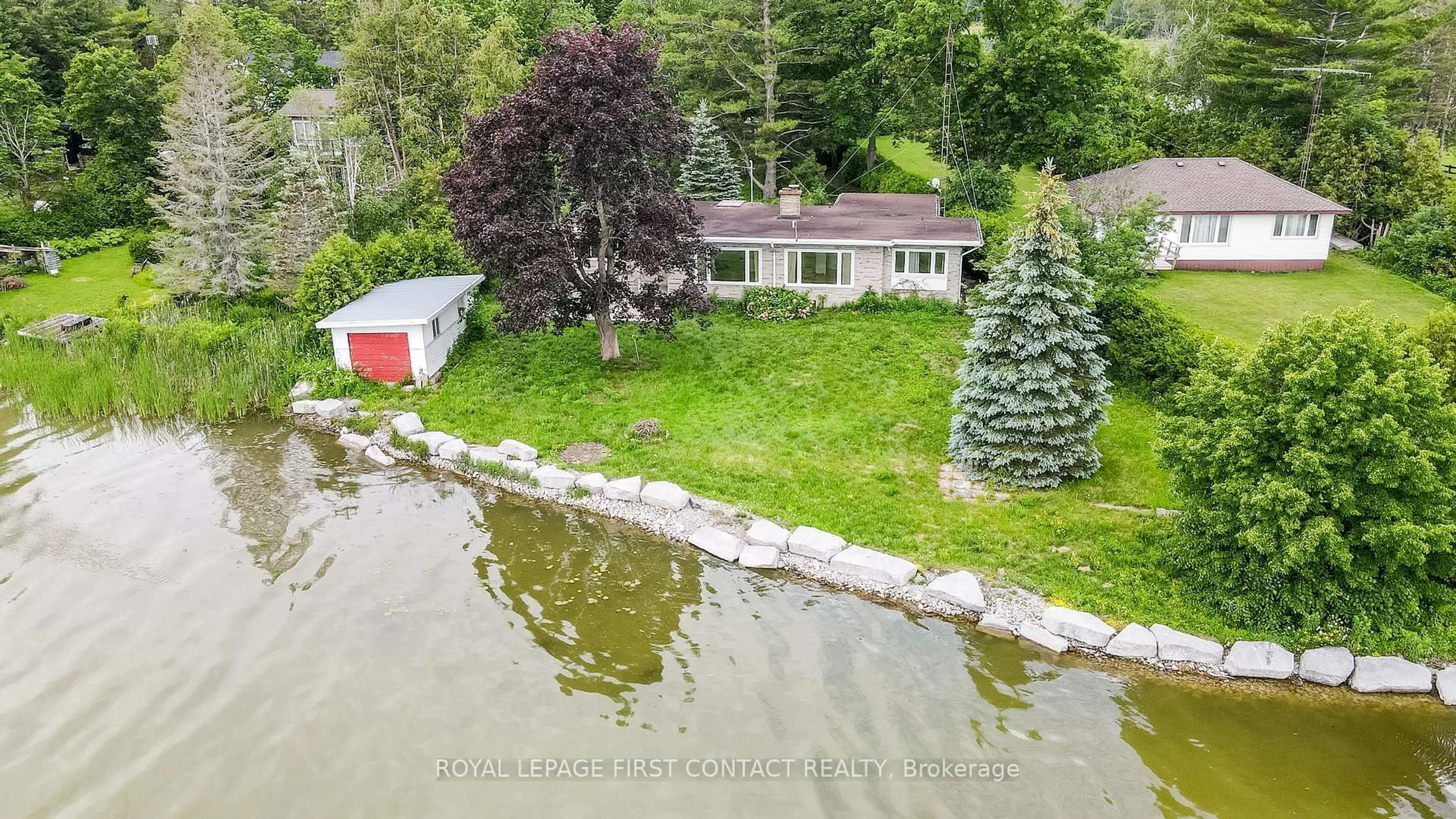 A pic from outside/outdoor area/front of a property/back of a property/a pic from drone, water/lake/river/ocean view for 21 Glassford Rd, Kawartha Lakes Ontario K0M 2C0