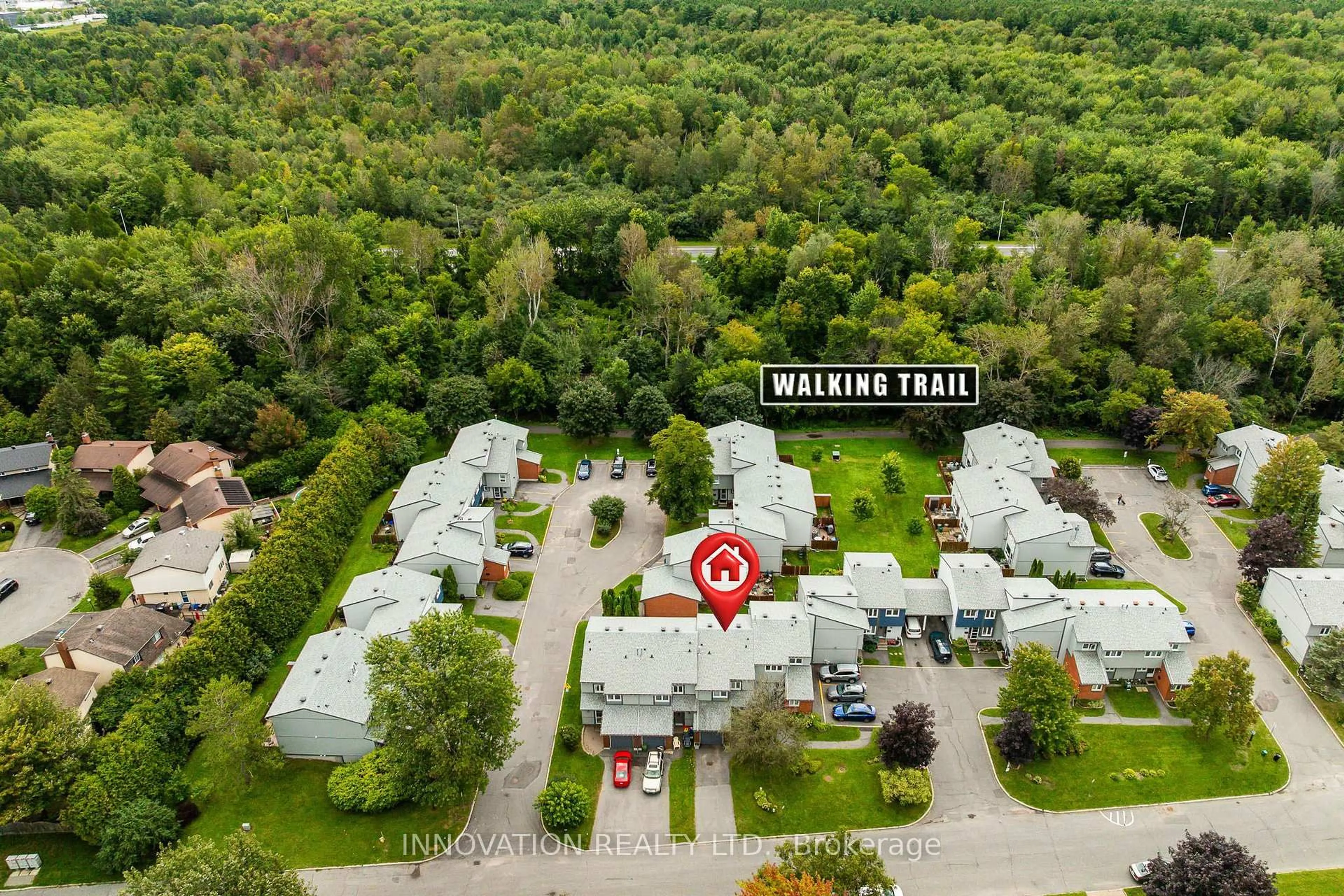 A pic from outside/outdoor area/front of a property/back of a property/a pic from drone, forest/trees view for 18 Benlea Dr #C, Ottawa Ontario K2G 4A8