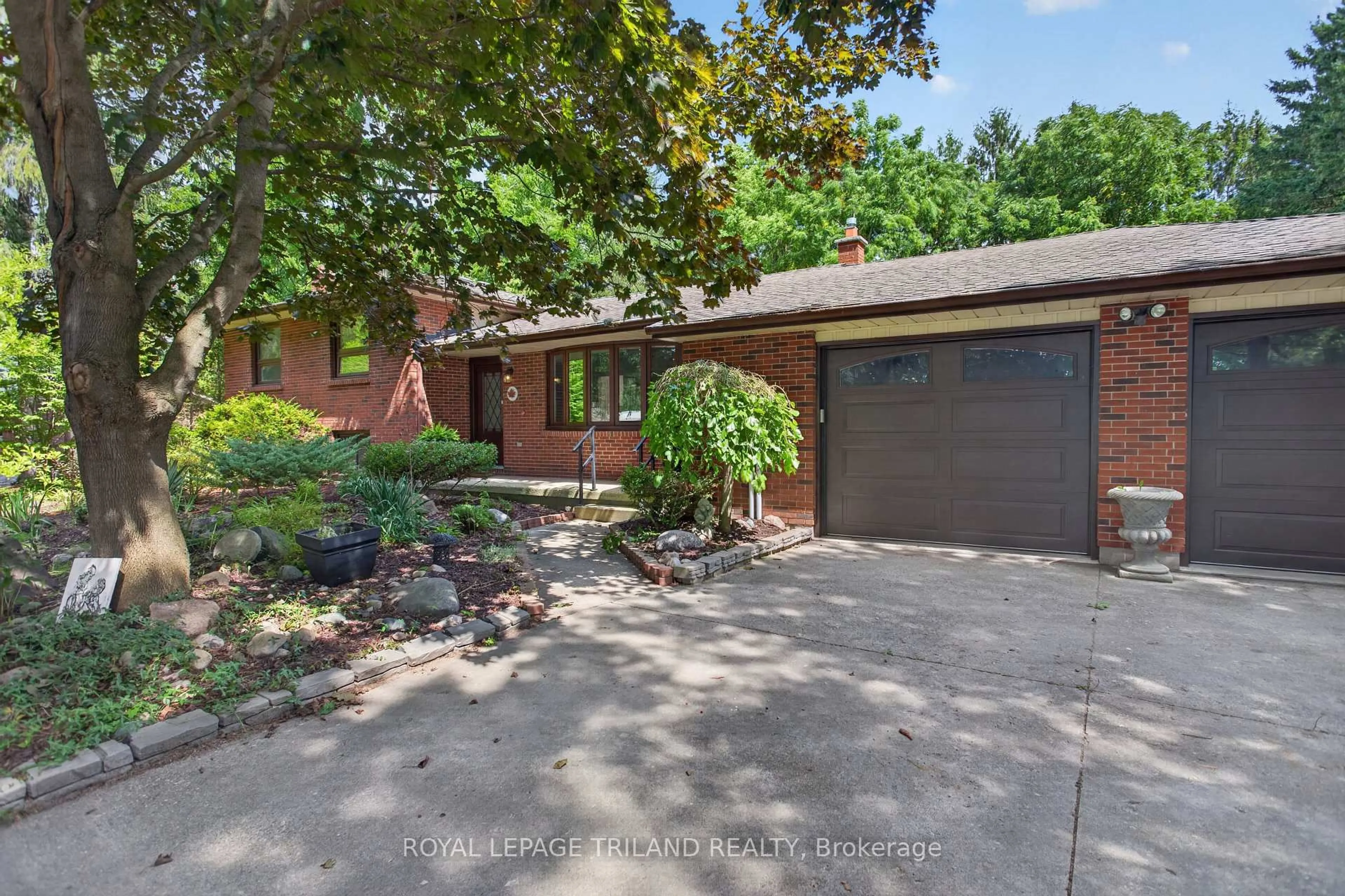 Home with brick exterior material, street for 115 Springer St, Middlesex Centre Ontario N0L 1R0