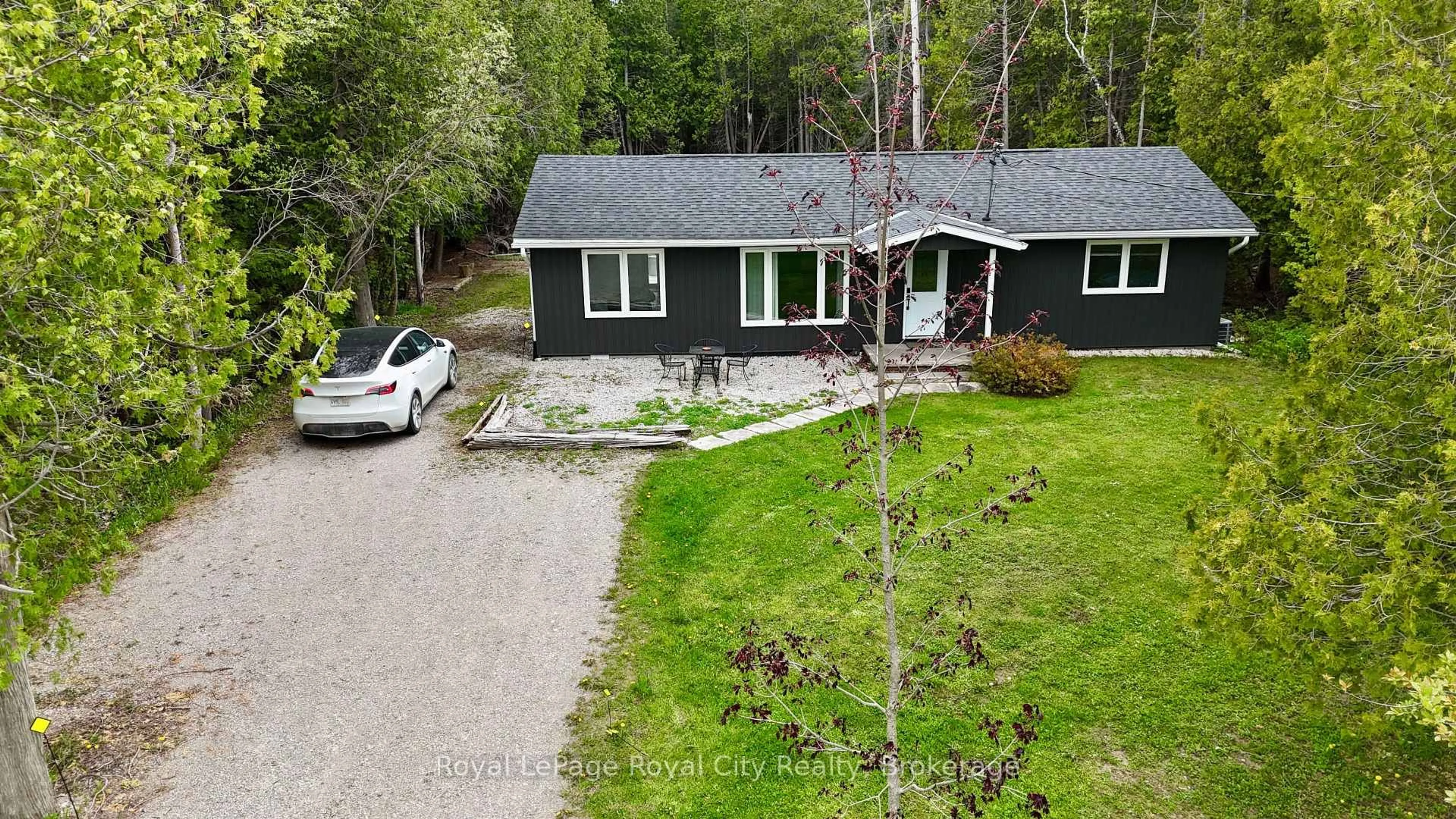 A pic from outside/outdoor area/front of a property/back of a property/a pic from drone, street for 7221 6 Highway, Northern Bruce Peninsula Ontario N0H 2R0