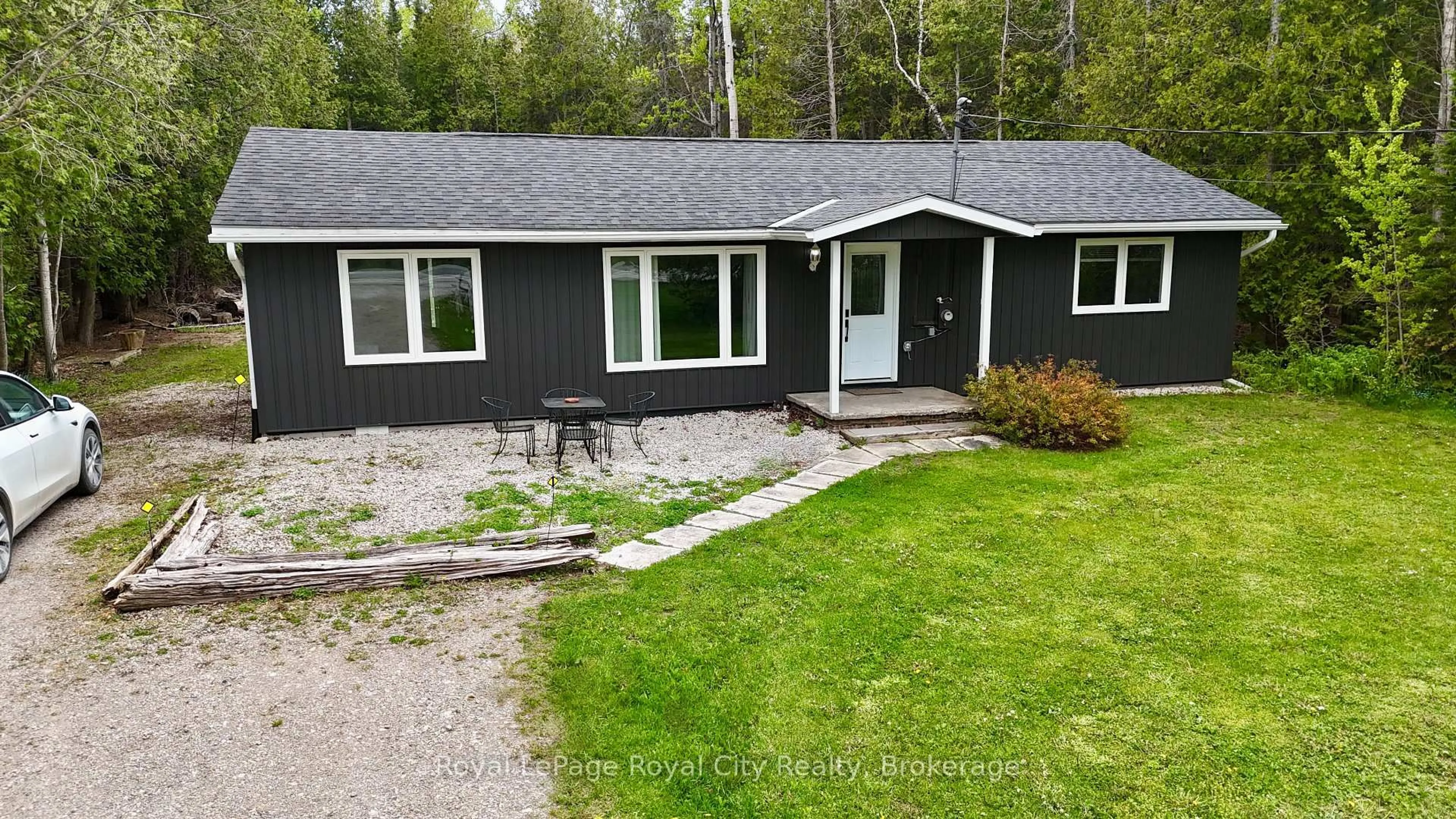 A pic from outside/outdoor area/front of a property/back of a property/a pic from drone, street for 7221 6 Highway, Northern Bruce Peninsula Ontario N0H 2R0