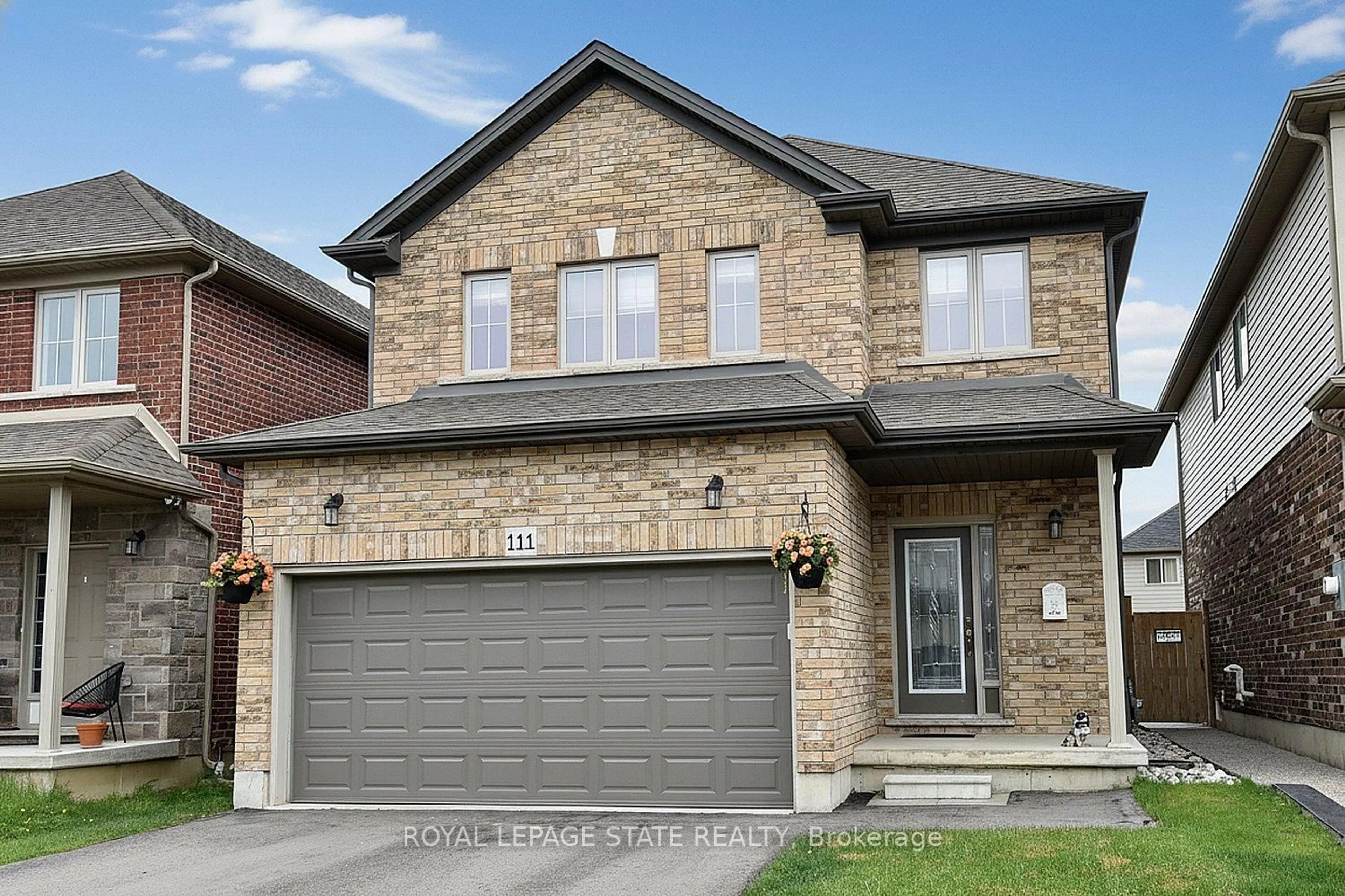 Home with brick exterior material, street for 111 Festival Way, Hamilton Ontario L0R 1C0