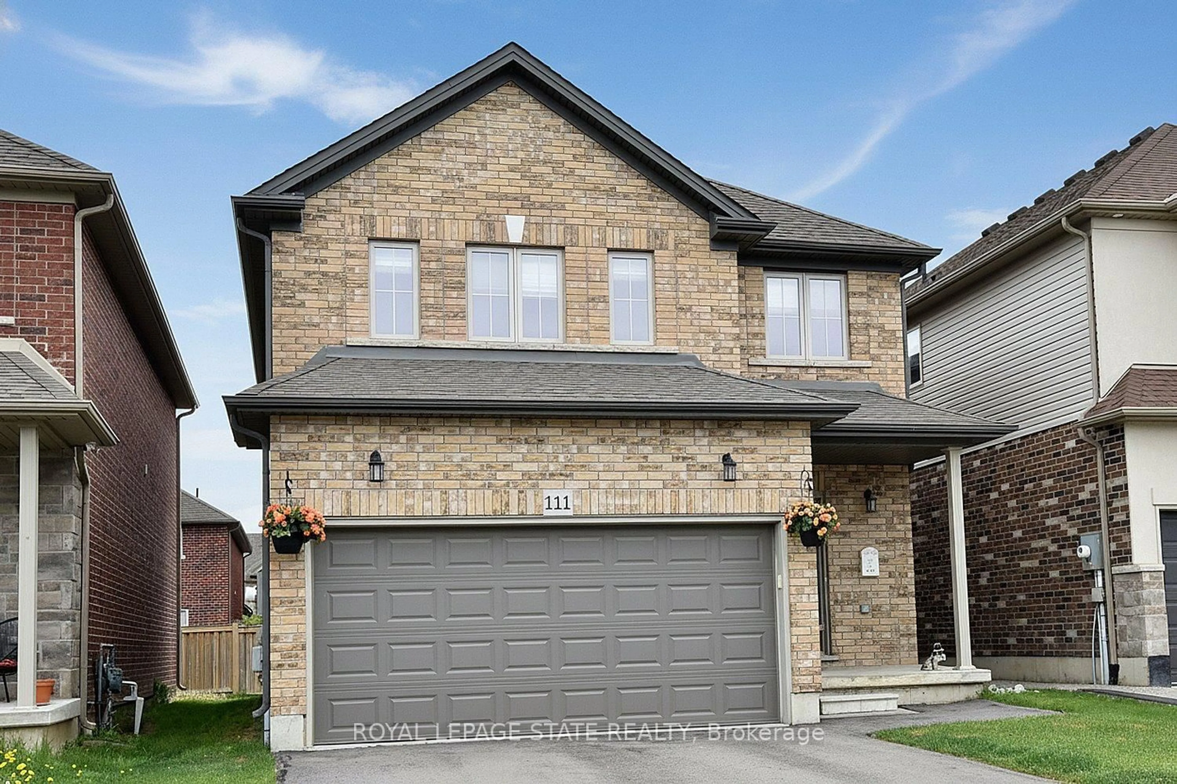 Home with brick exterior material, street for 111 Festival Way, Hamilton Ontario L0R 1C0