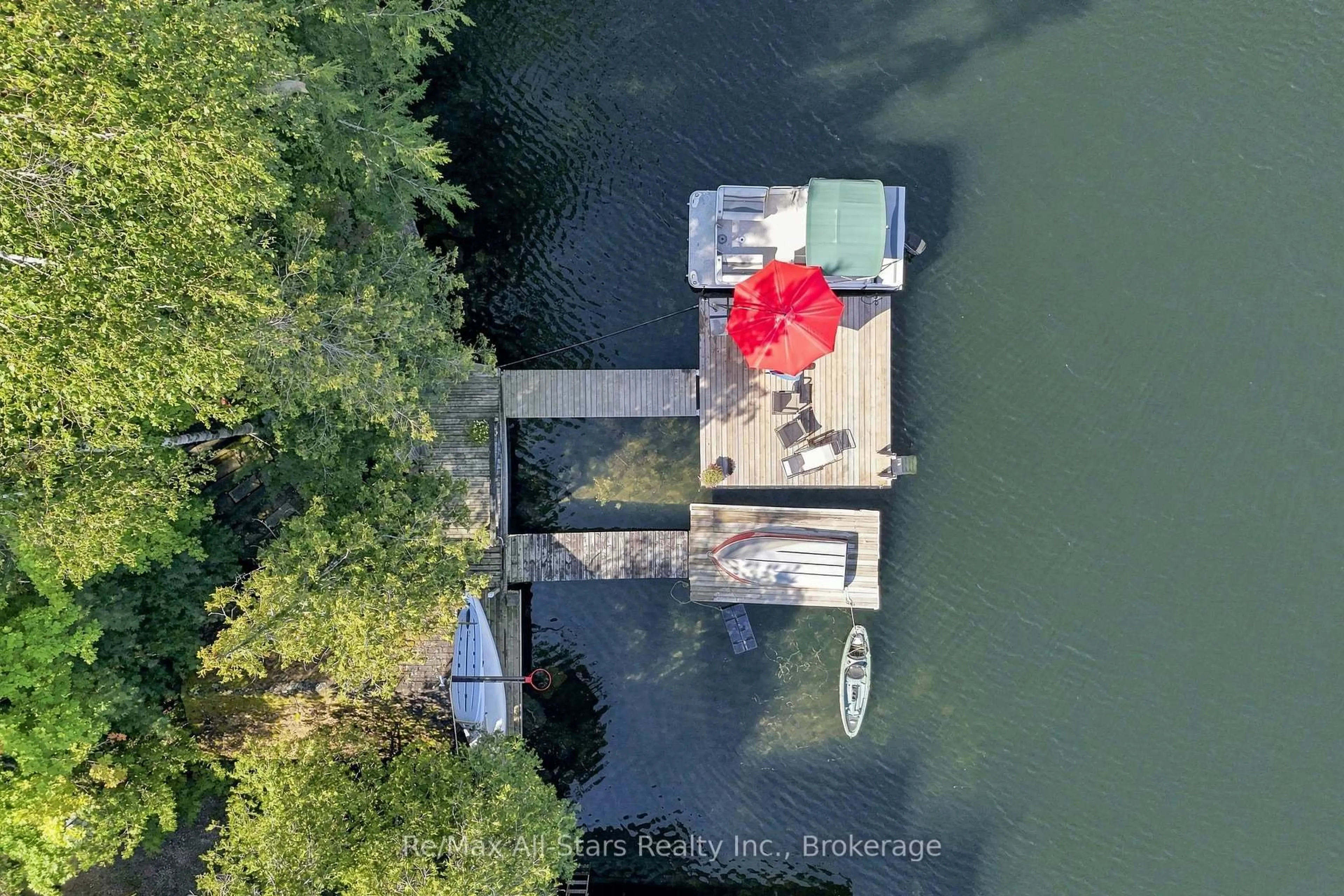 A pic from outside/outdoor area/front of a property/back of a property/a pic from drone, water/lake/river/ocean view for 1561 Crystal Lake, Trent Lakes Ontario K0M 2A0