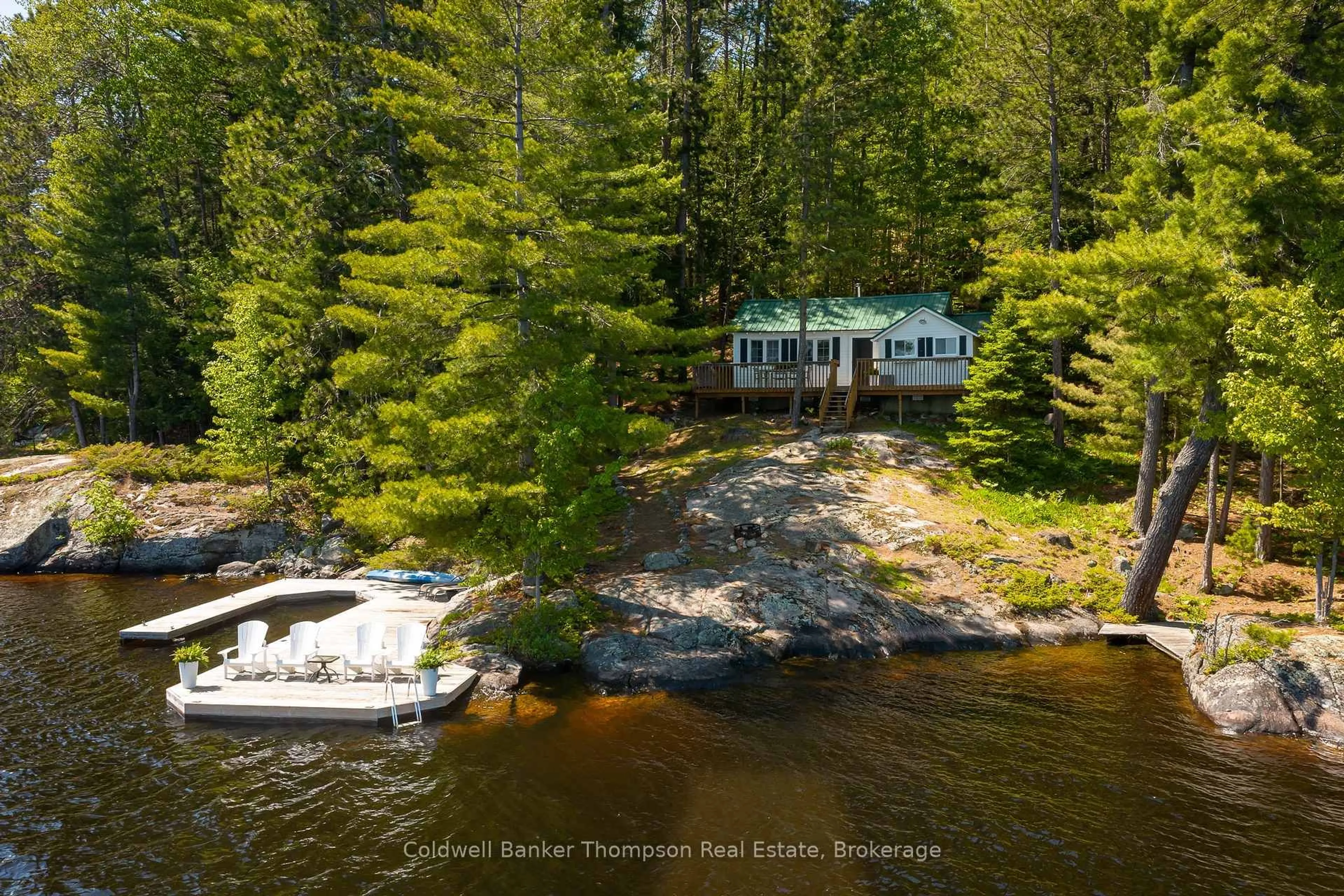 A pic from outside/outdoor area/front of a property/back of a property/a pic from drone, water/lake/river/ocean view for 199 Gall Tr, Huntsville Ontario P0B 1M0