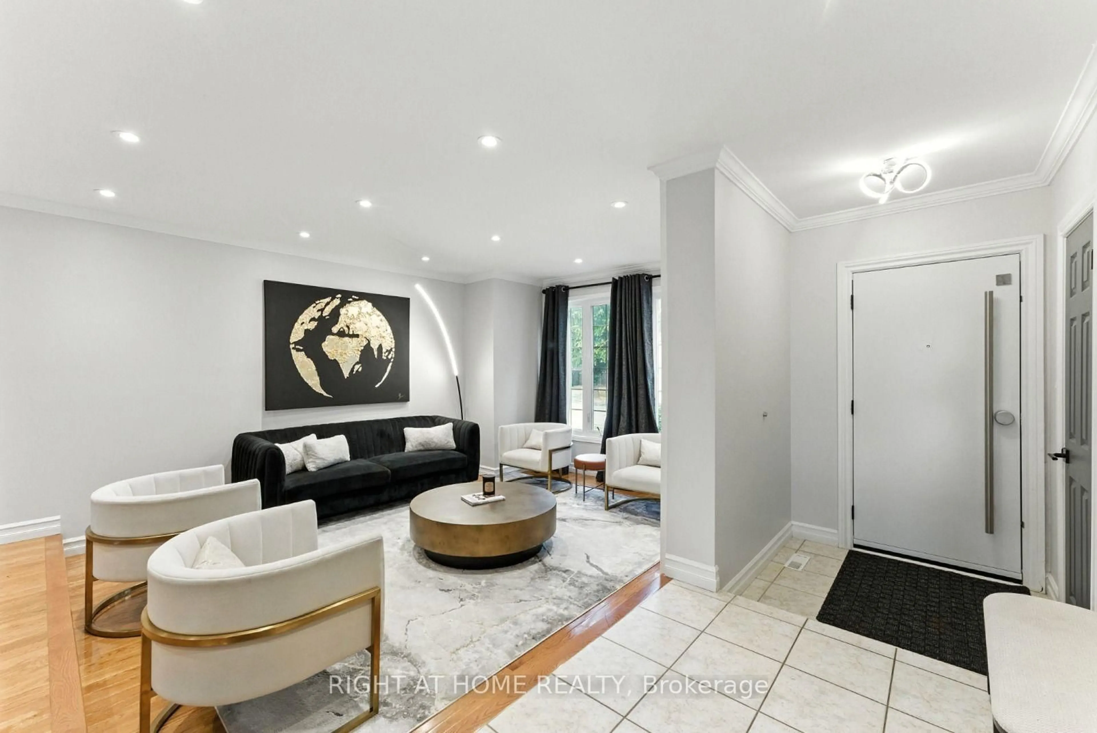 Living room with furniture, ceramic/tile floor for 65 Sunvale Pl, Hamilton Ontario L8E 4Z6