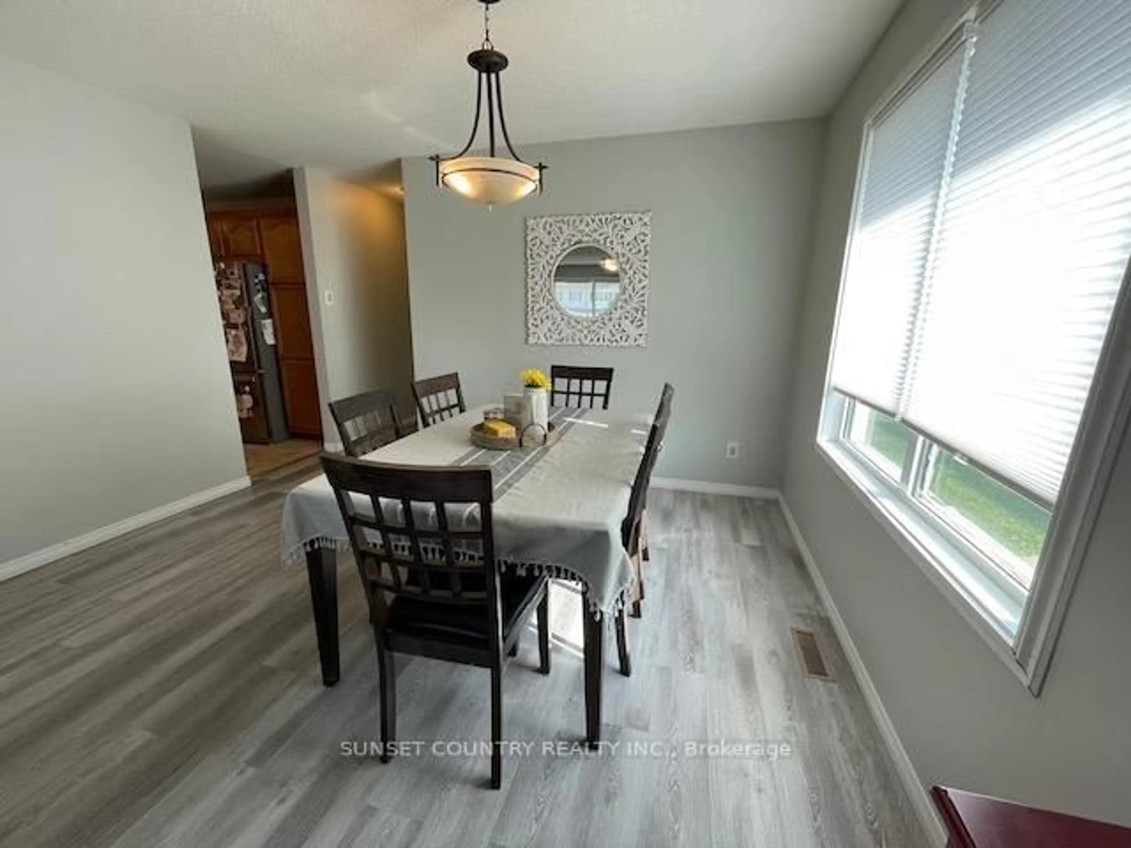 Dining room, wood/laminate floor for 9 Mario Milanese Pl, Dryden Ontario P8N 3G6