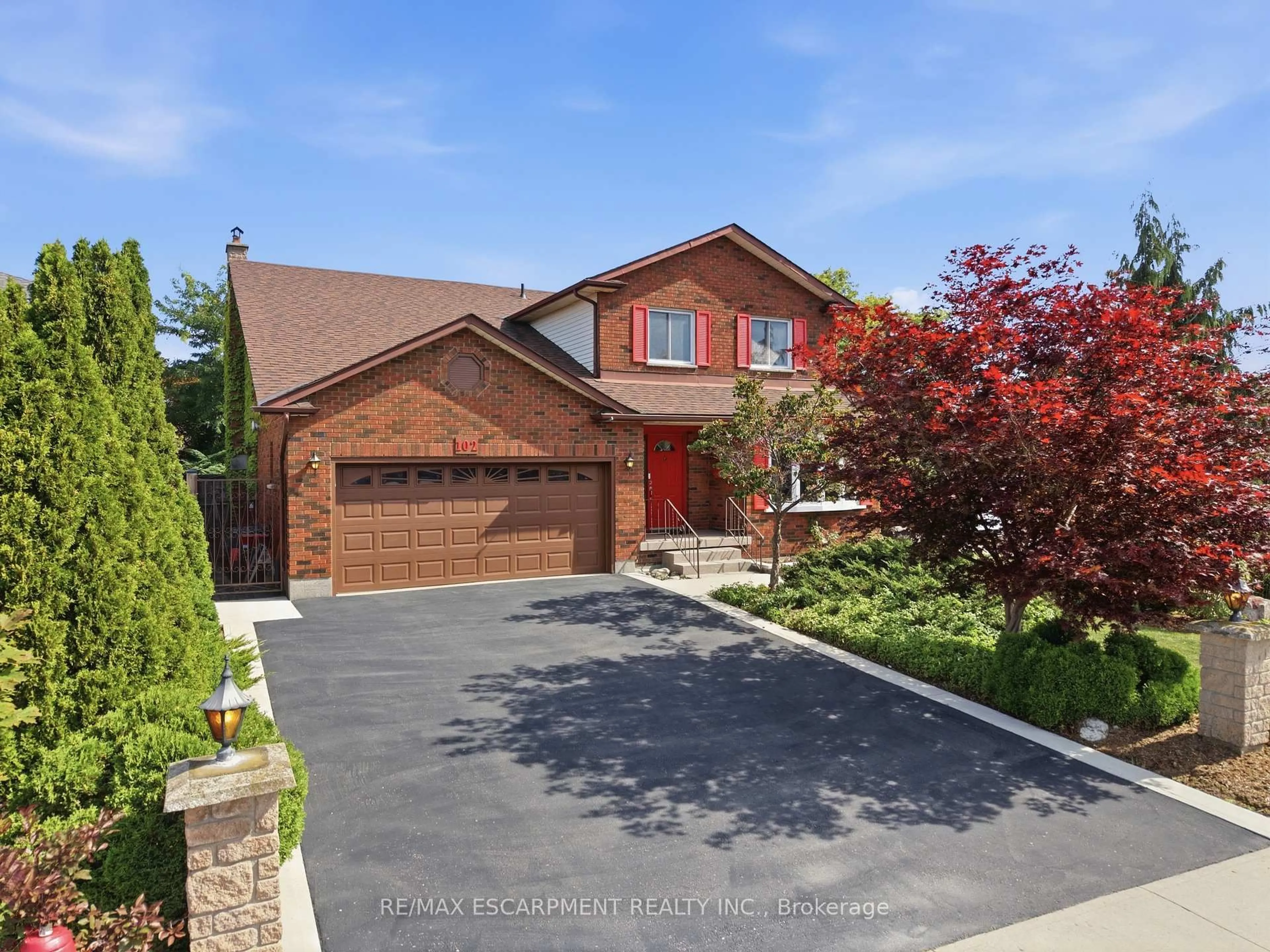 Home with brick exterior material, street for 102 Trenholme Cres, Hamilton Ontario L8W 2L6