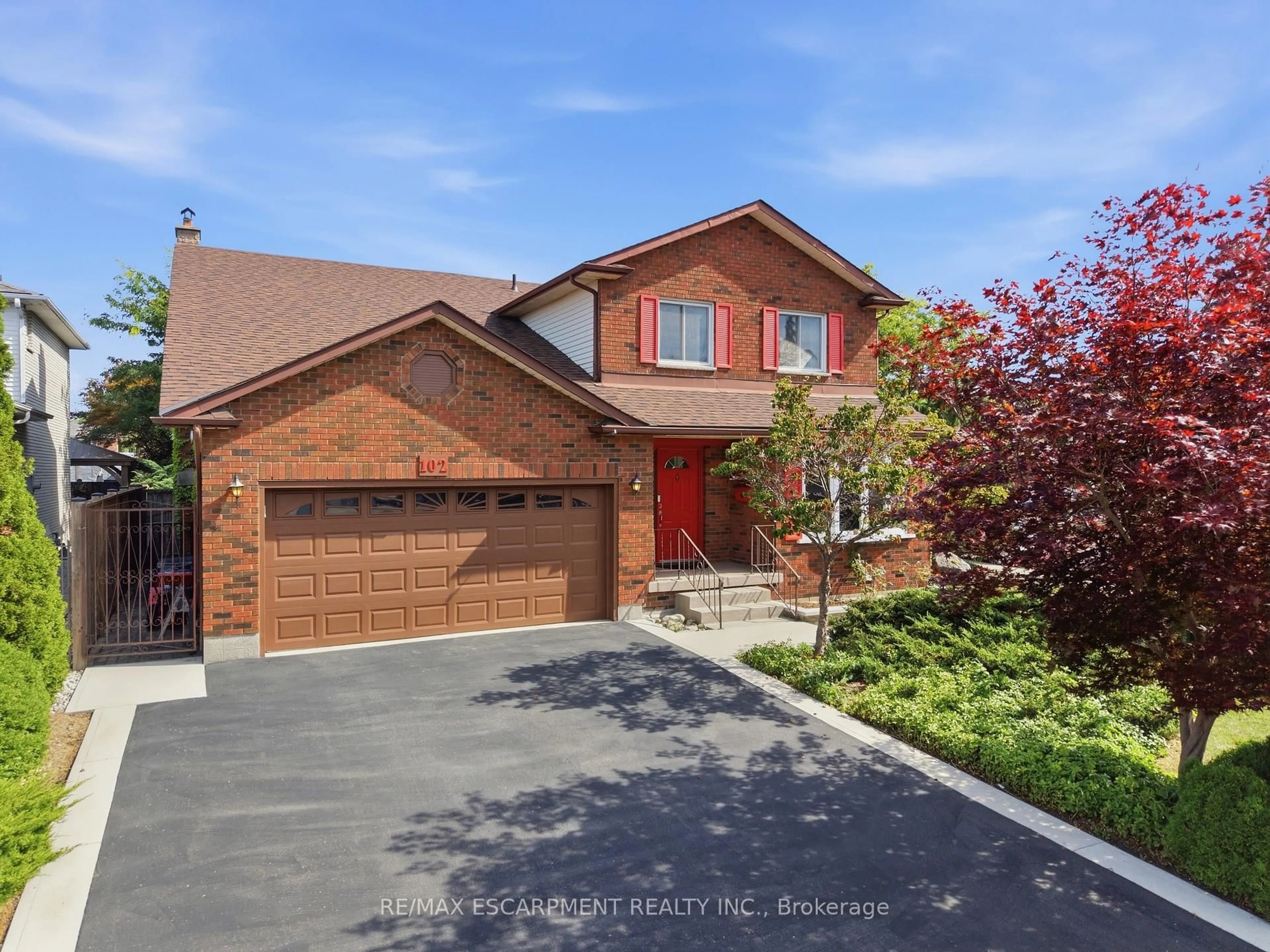 Home with brick exterior material, street for 102 Trenholme Cres, Hamilton Ontario L8W 2L6