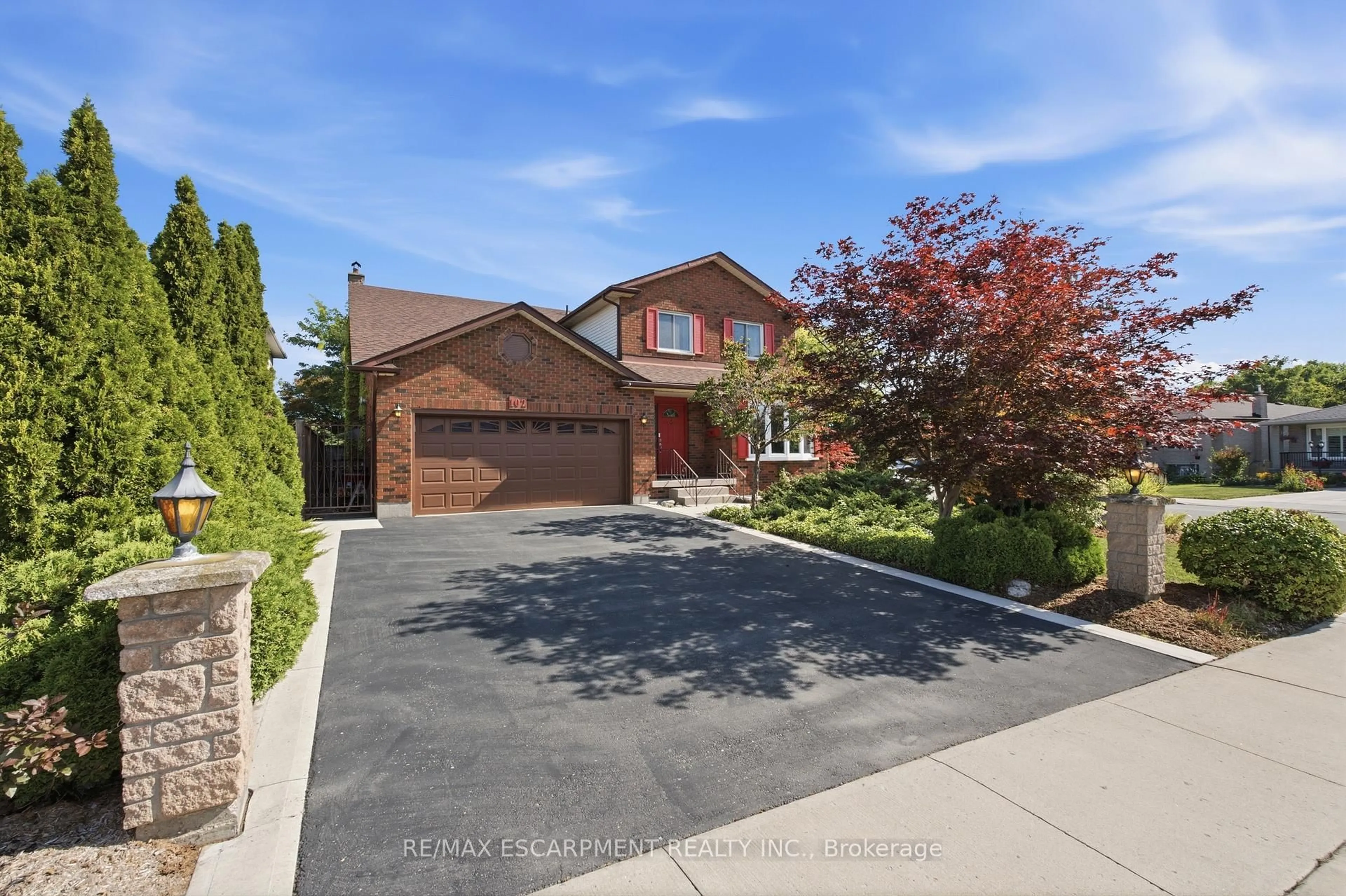 Home with brick exterior material, street for 102 Trenholme Cres, Hamilton Ontario L8W 2L6