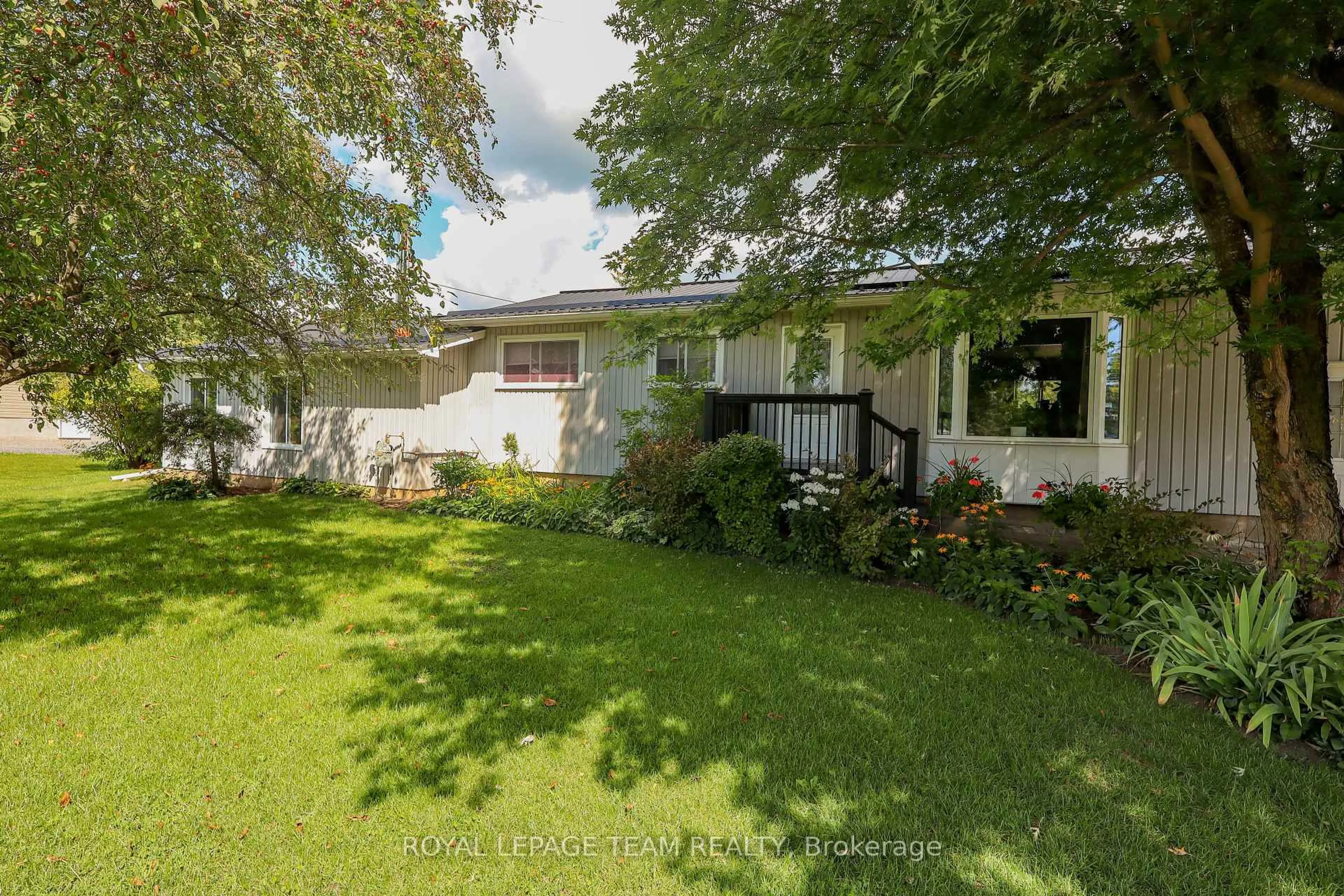 A pic from outside/outdoor area/front of a property/back of a property/a pic from drone, street for 3041 Bridge St, North Dundas Ontario K0E 1W0