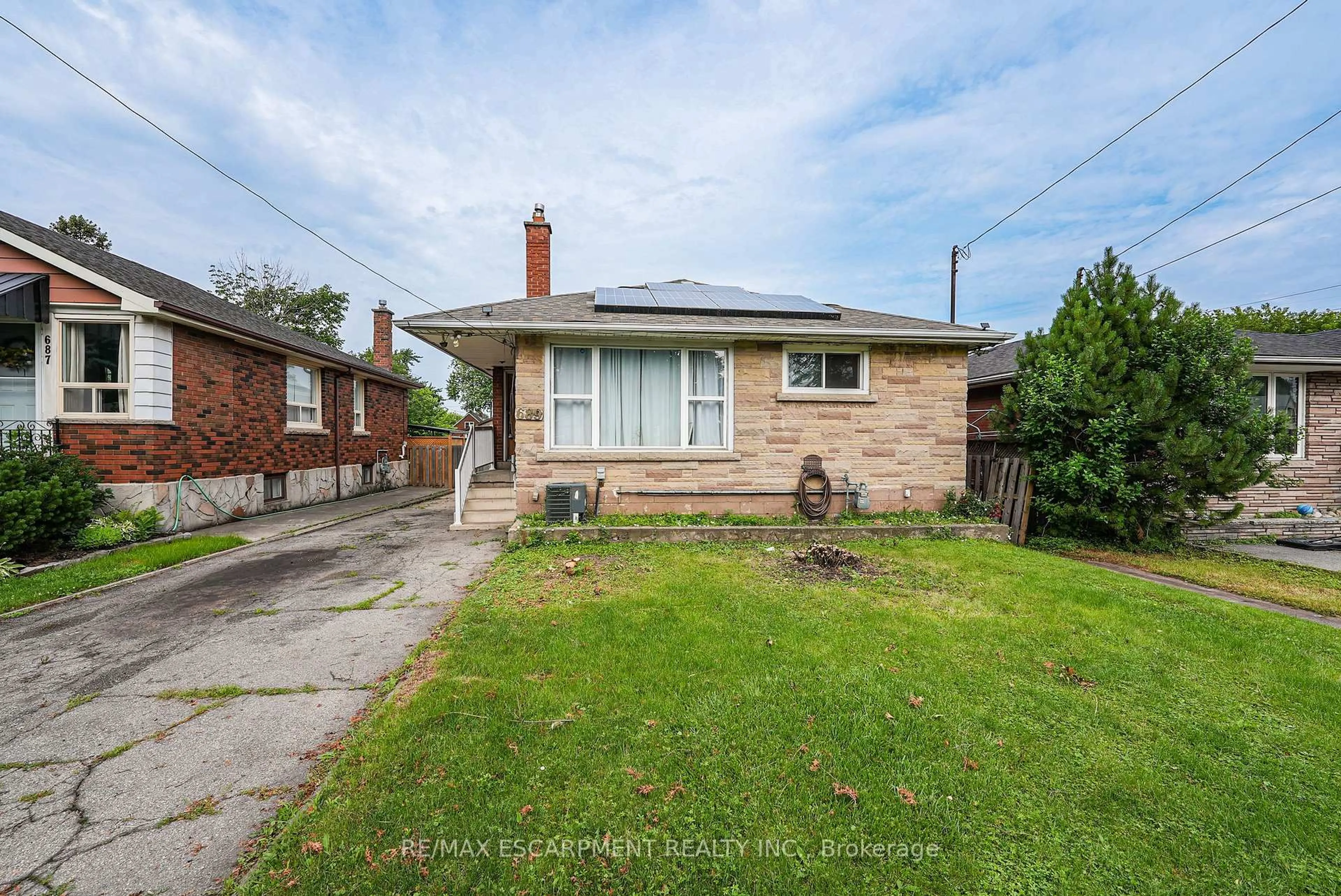 Home with brick exterior material, street for 689 Burgess Ave, Hamilton Ontario L8H 6J2