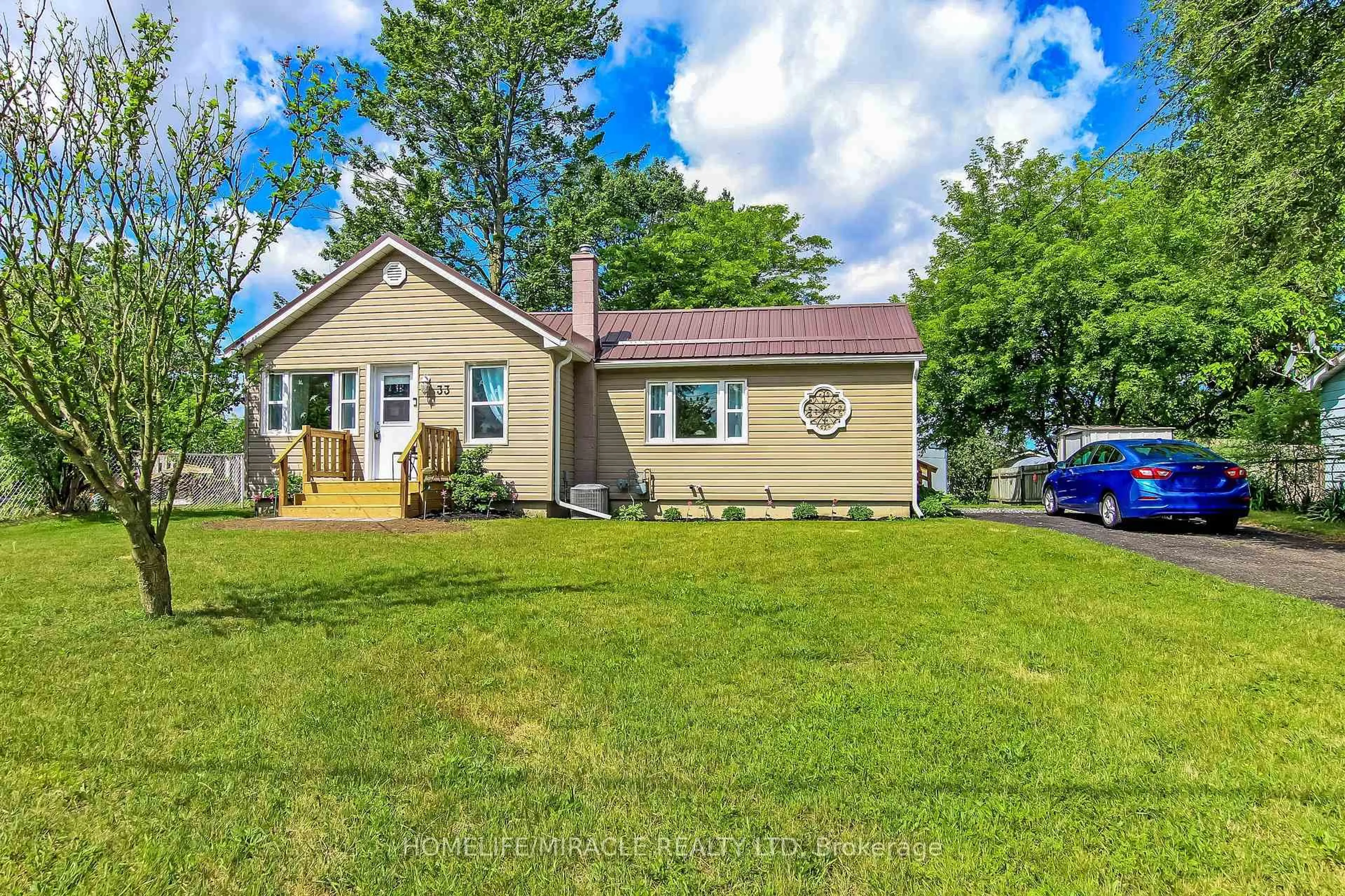 Home with vinyl exterior material, street for 33 Ontario St, Tillsonburg Ontario N4G 2V7