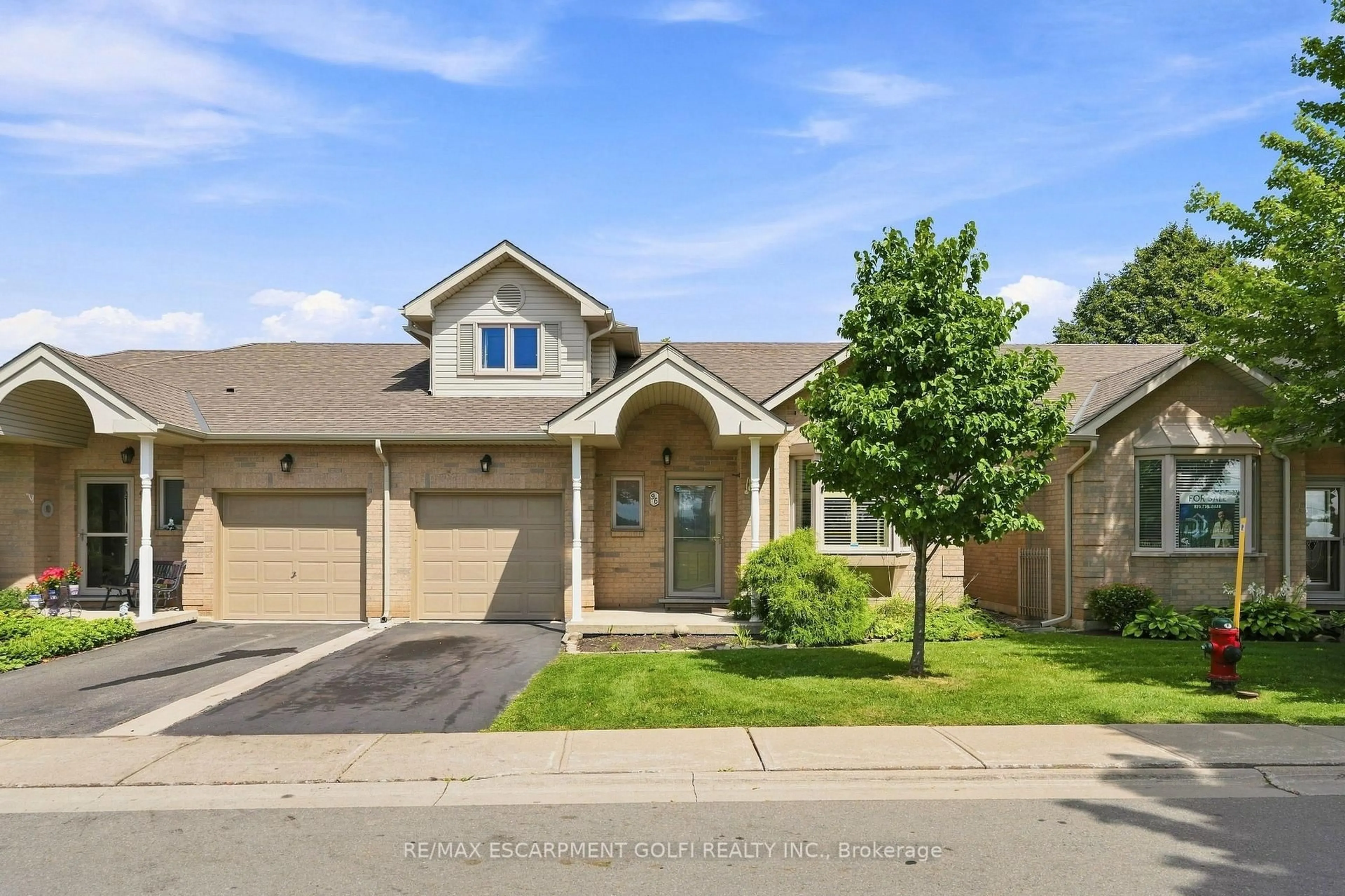 Home with brick exterior material, street for 96 Greentrail Dr #43, Hamilton Ontario L0R 1W0