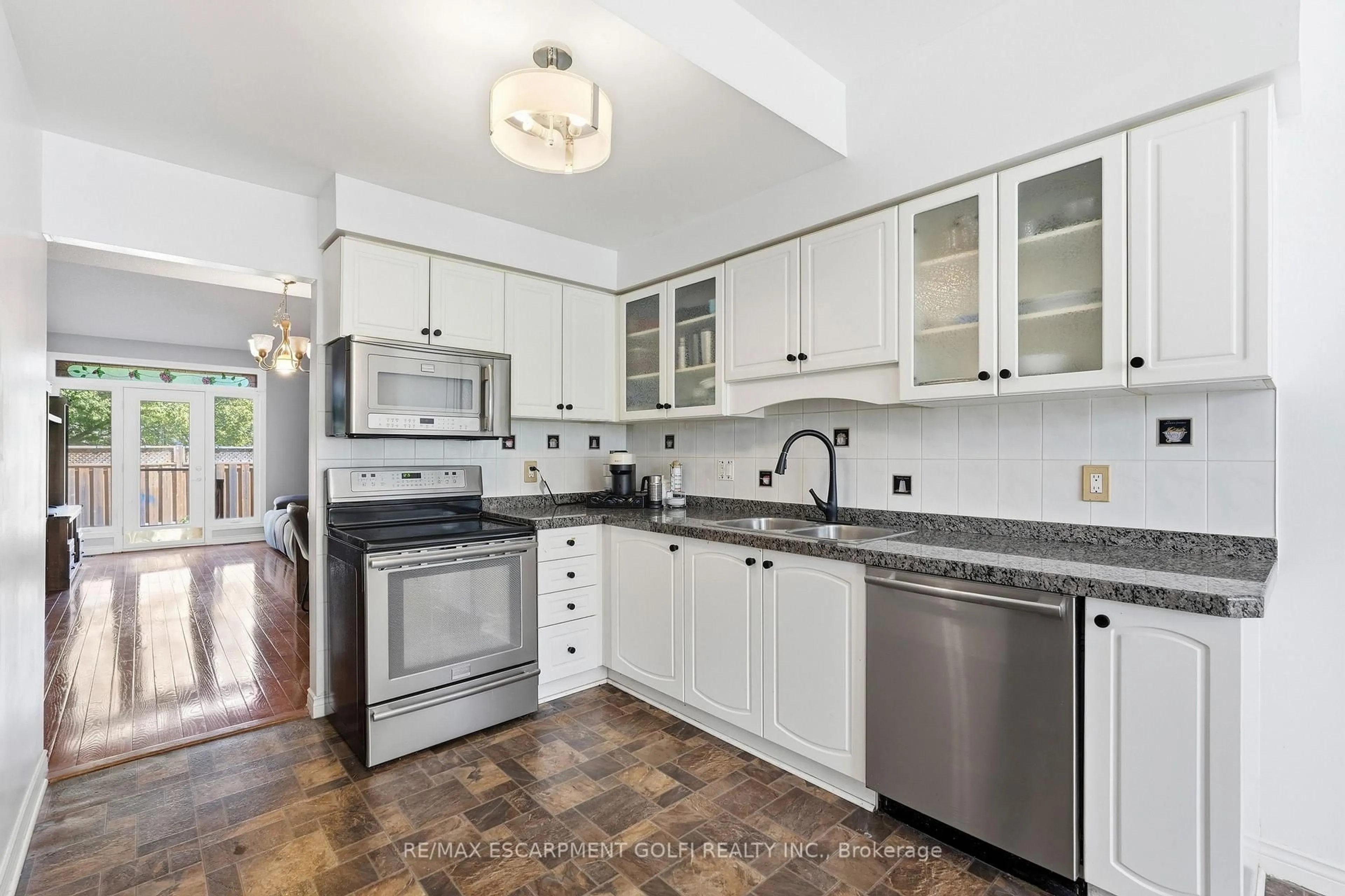 Open concept kitchen, ceramic/tile floor for 96 Greentrail Dr #43, Hamilton Ontario L0R 1W0