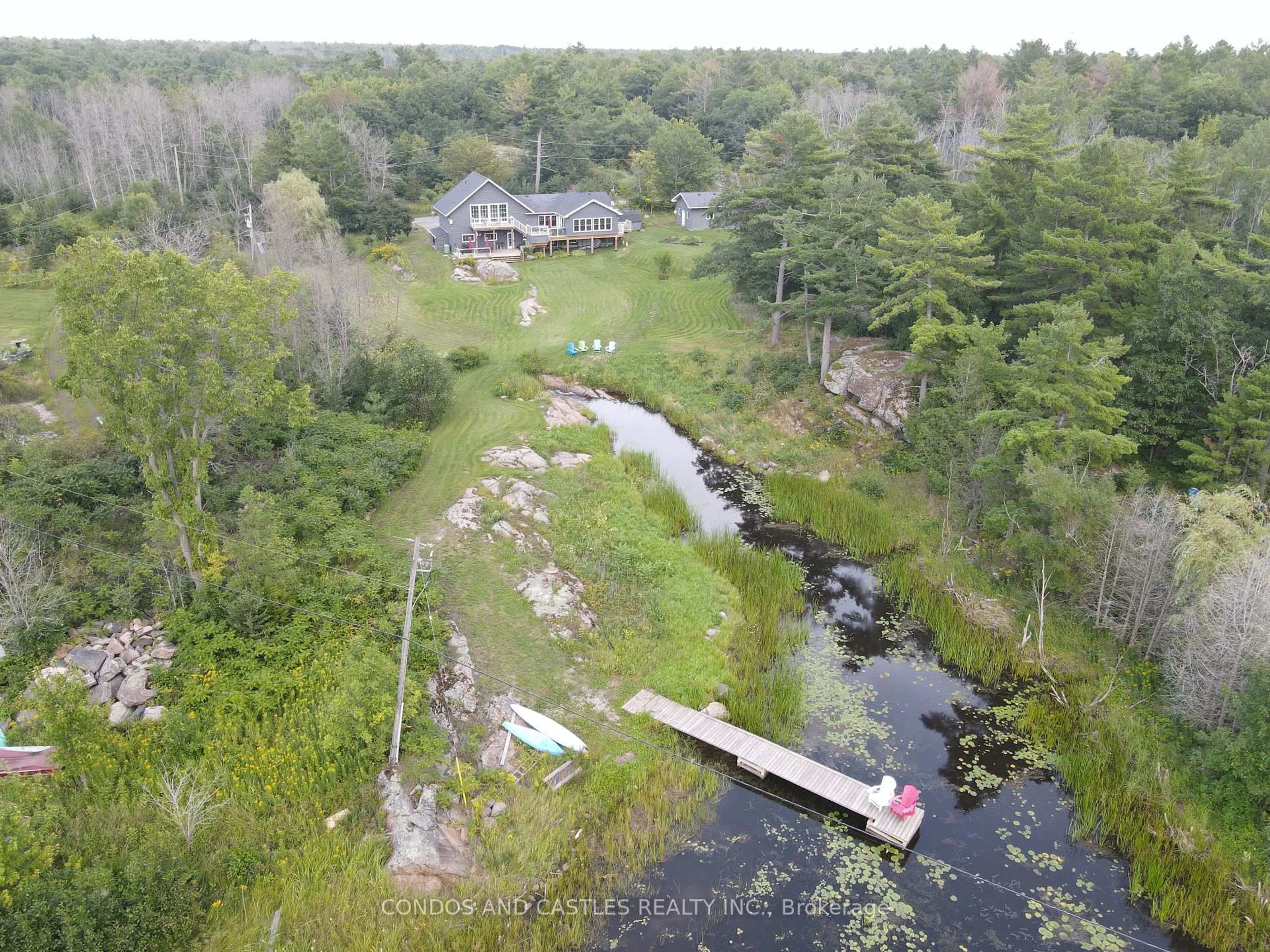A pic from outside/outdoor area/front of a property/back of a property/a pic from drone, water/lake/river/ocean view for 9 Osprey Way, Georgian Bay Ontario L0K 1S0