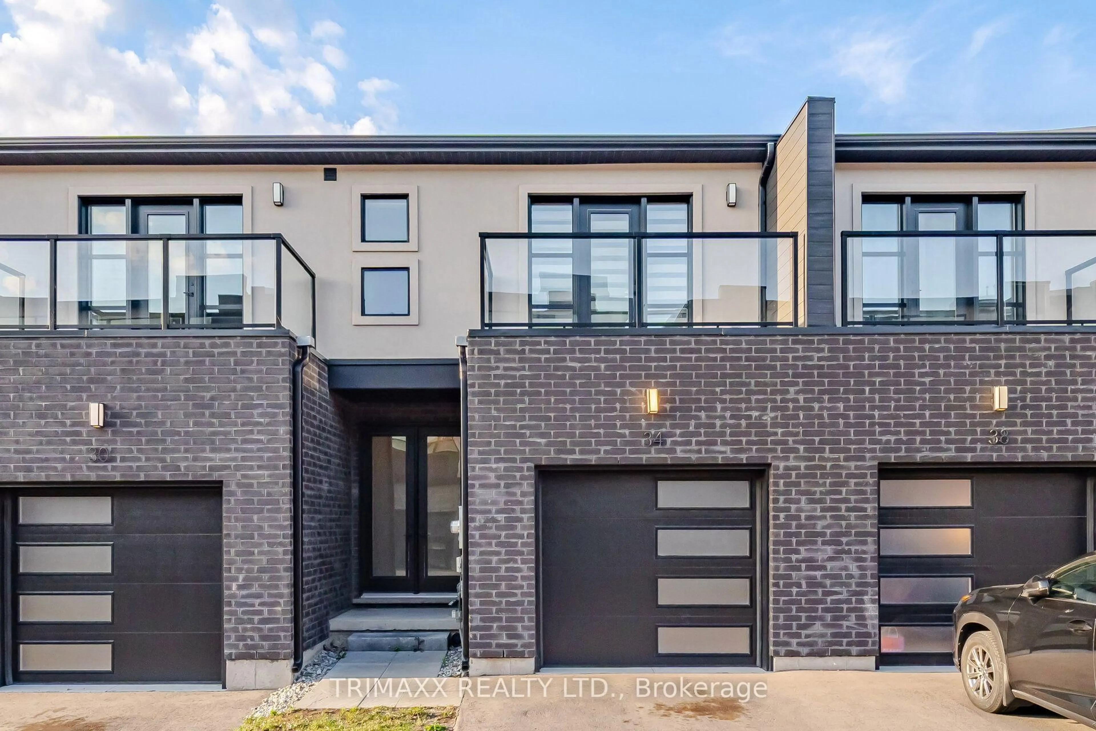 Home with brick exterior material, street for 34 Warren Tr #48, Welland Ontario L3B 0N8