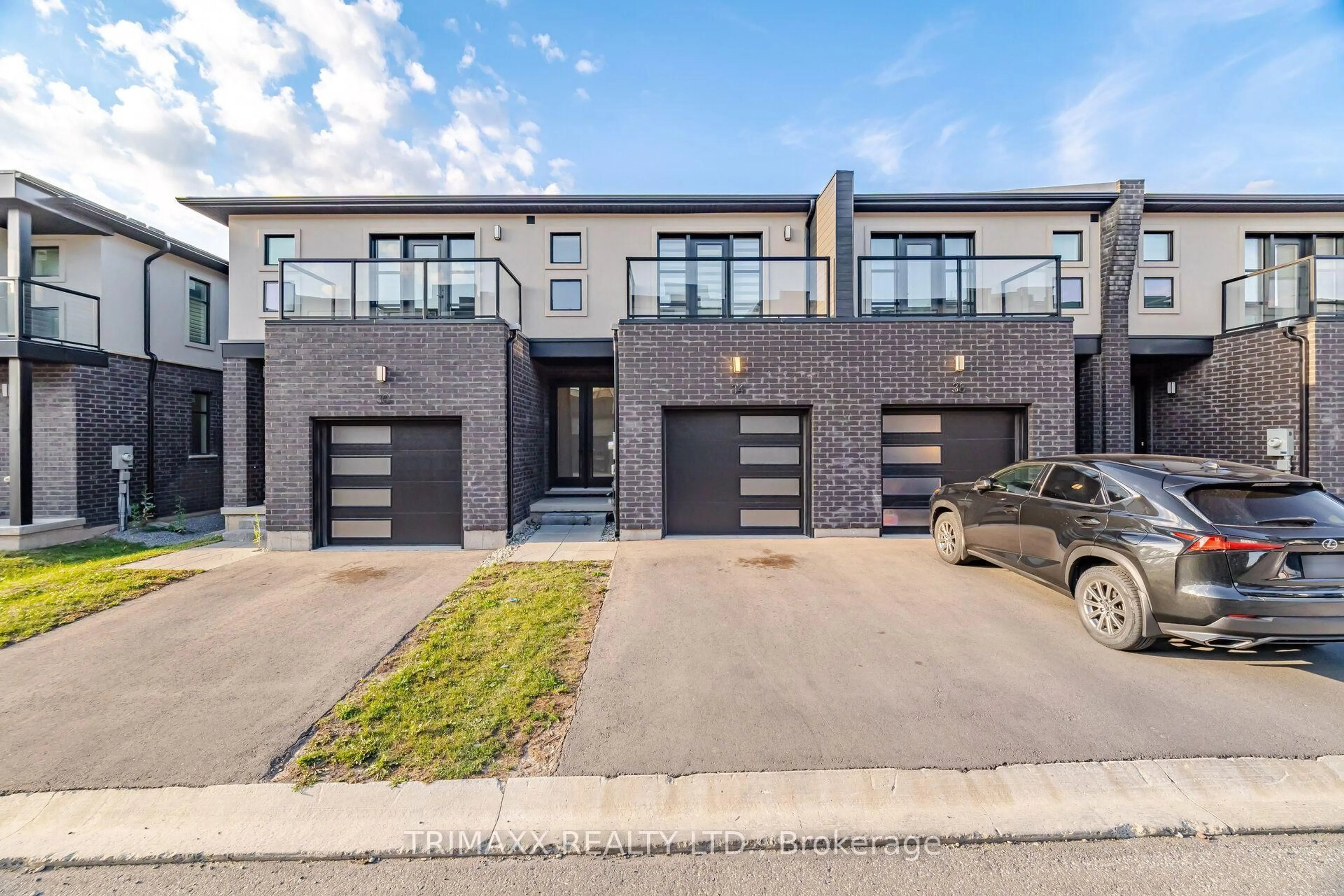 Home with brick exterior material, street for 34 Warren Tr #48, Welland Ontario L3B 0N8