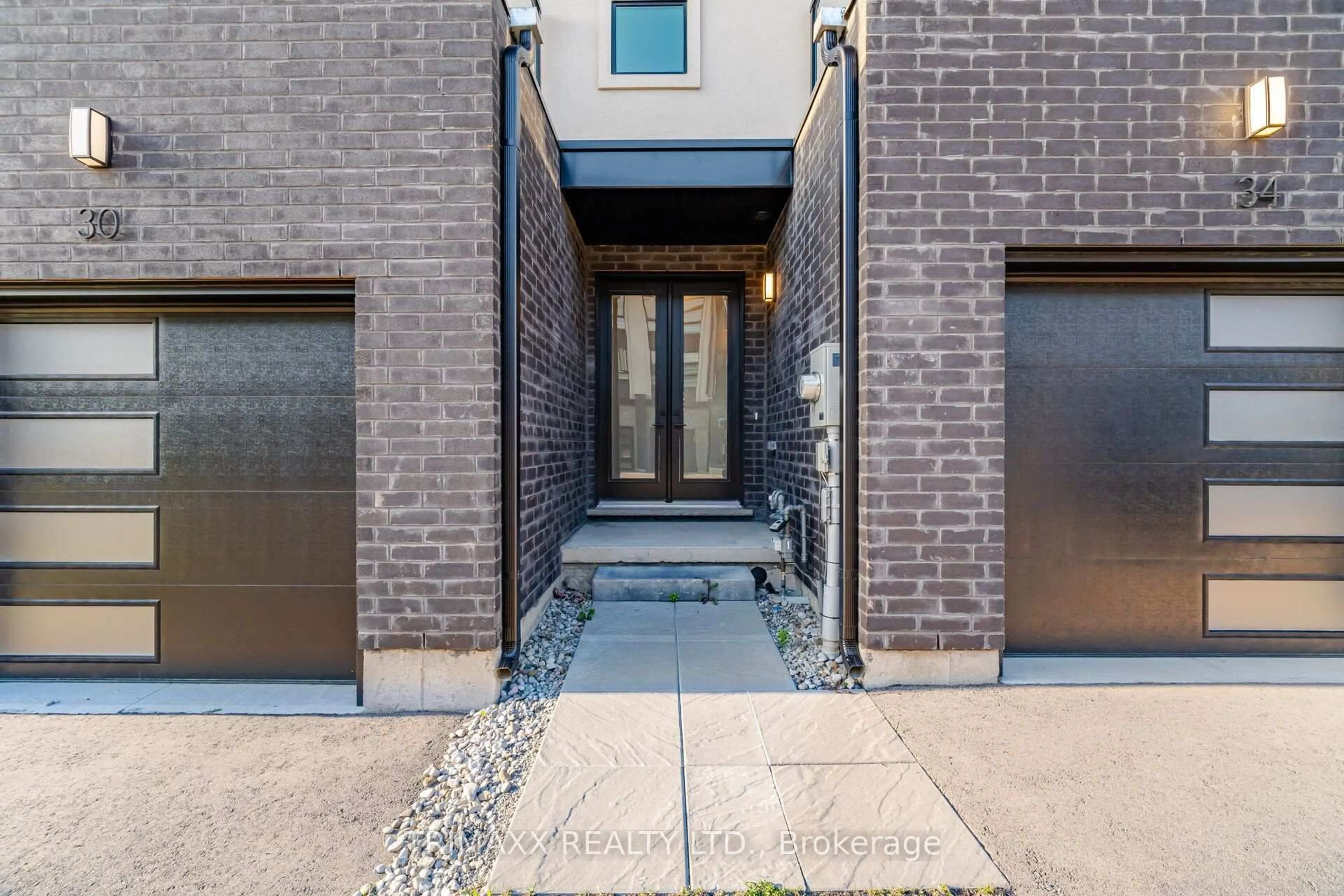 Home with brick exterior material, street for 34 Warren Tr #48, Welland Ontario L3B 0N8