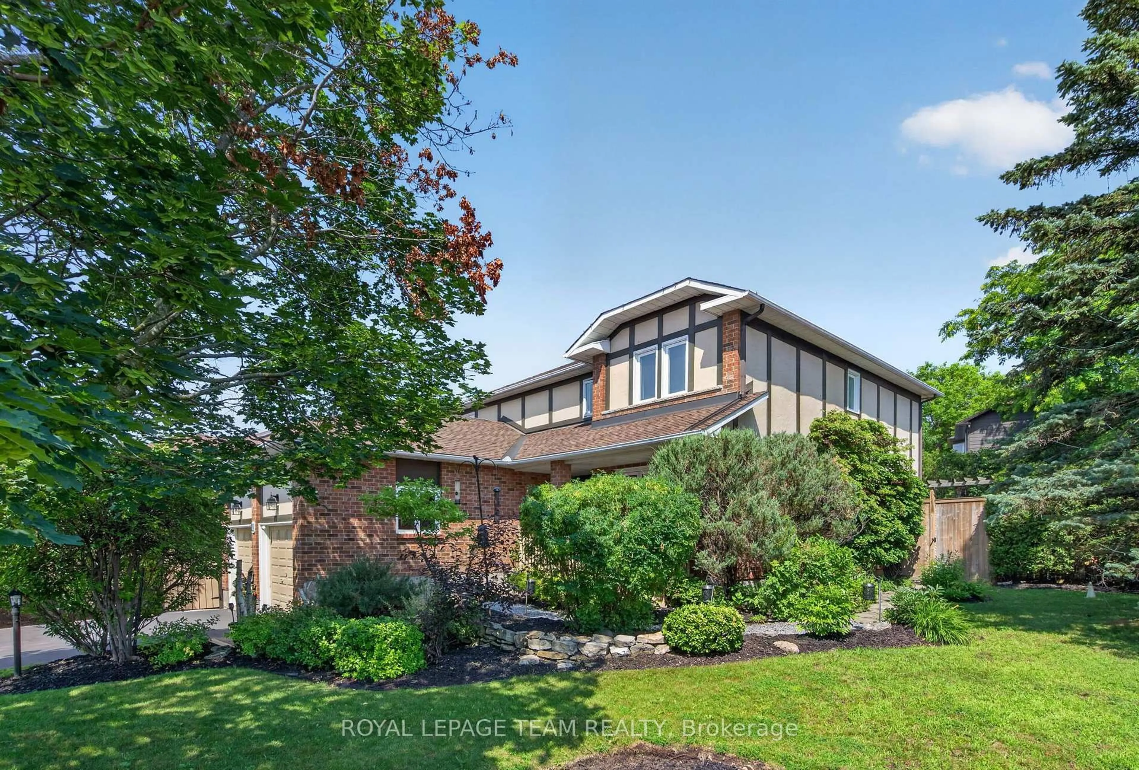 Home with brick exterior material, street for 11 Fessenden Way, Ottawa Ontario K2L 3L1
