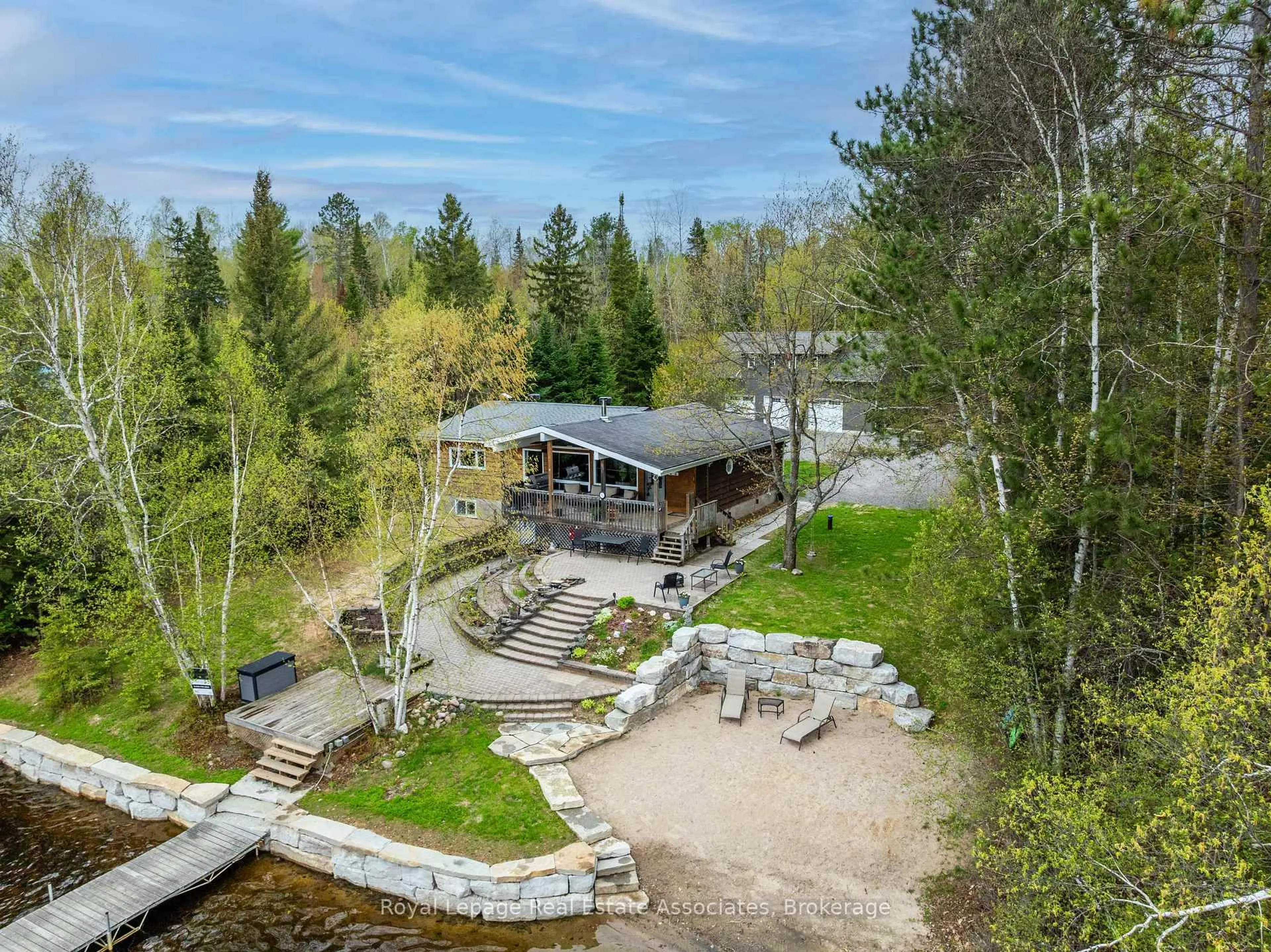 A pic from outside/outdoor area/front of a property/back of a property/a pic from drone, forest/trees view for 196 Circle Rd, Maynooth Ontario K0L 2K0