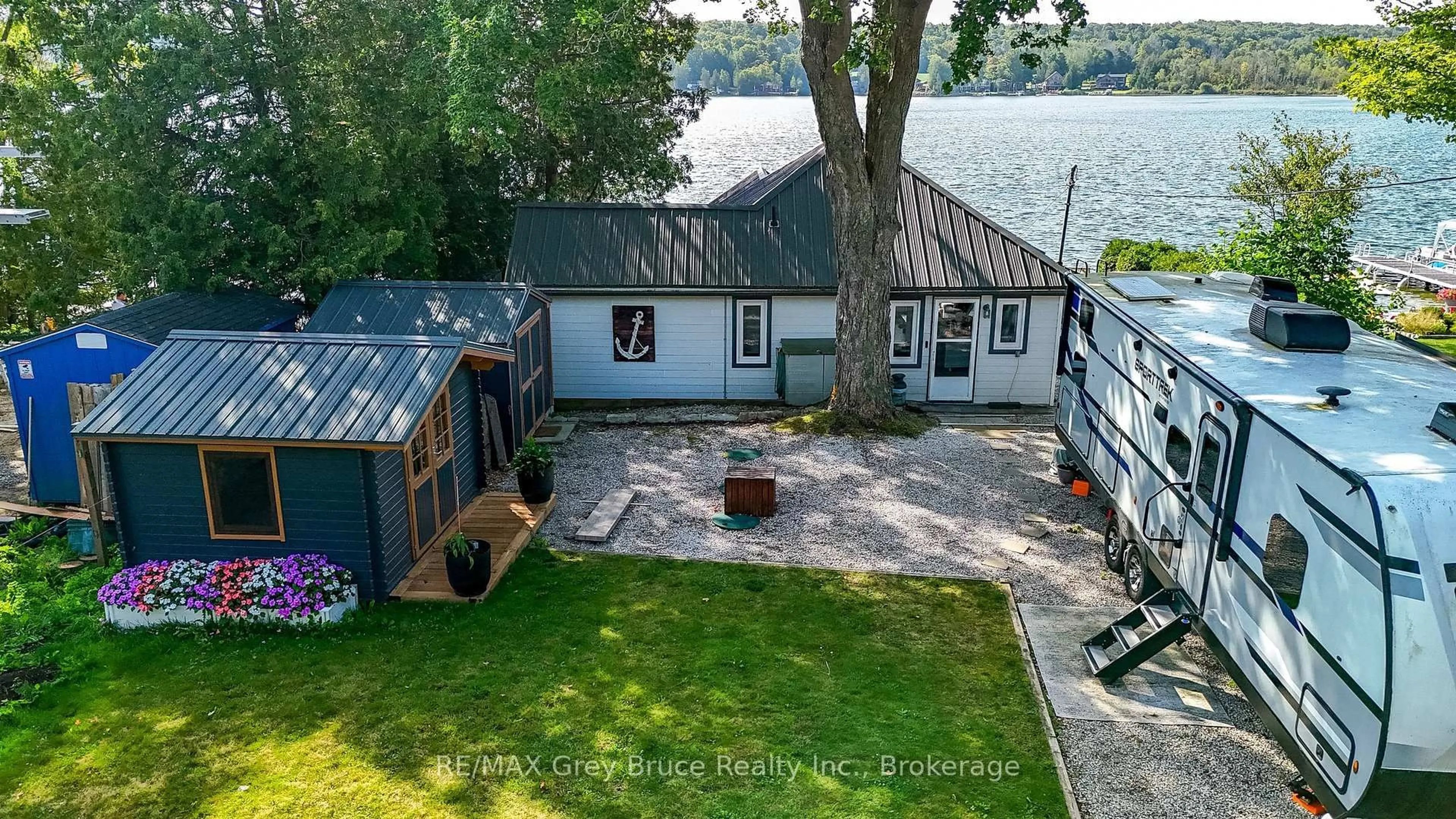 A pic from outside/outdoor area/front of a property/back of a property/a pic from drone, water/lake/river/ocean view for 38 Maple Dr, South Bruce Peninsula Ontario N0H 1A0