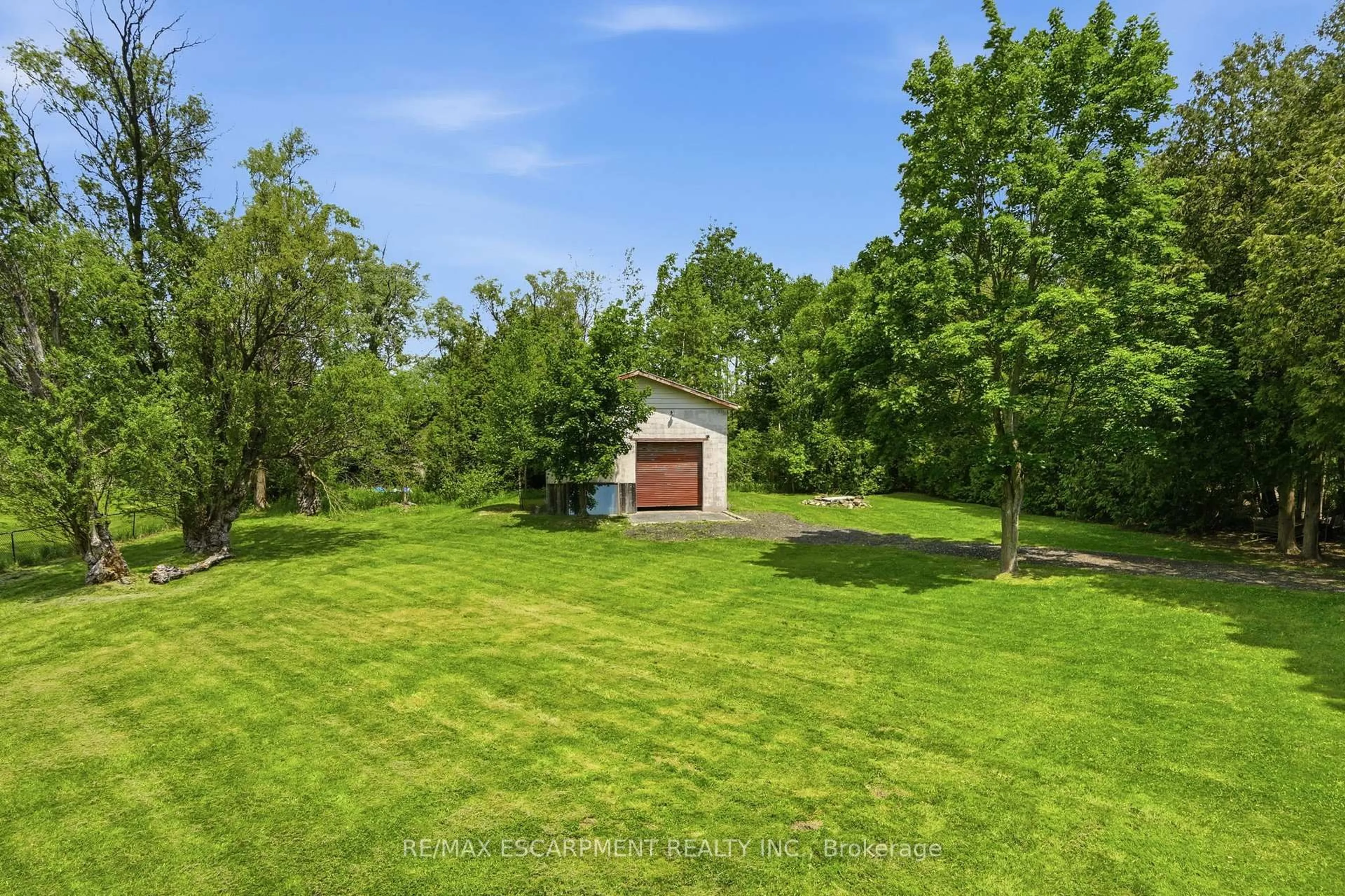 A pic from outside/outdoor area/front of a property/back of a property/a pic from drone, water/lake/river/ocean view for 318 Freelton Rd, Hamilton Ontario N0B 2J0