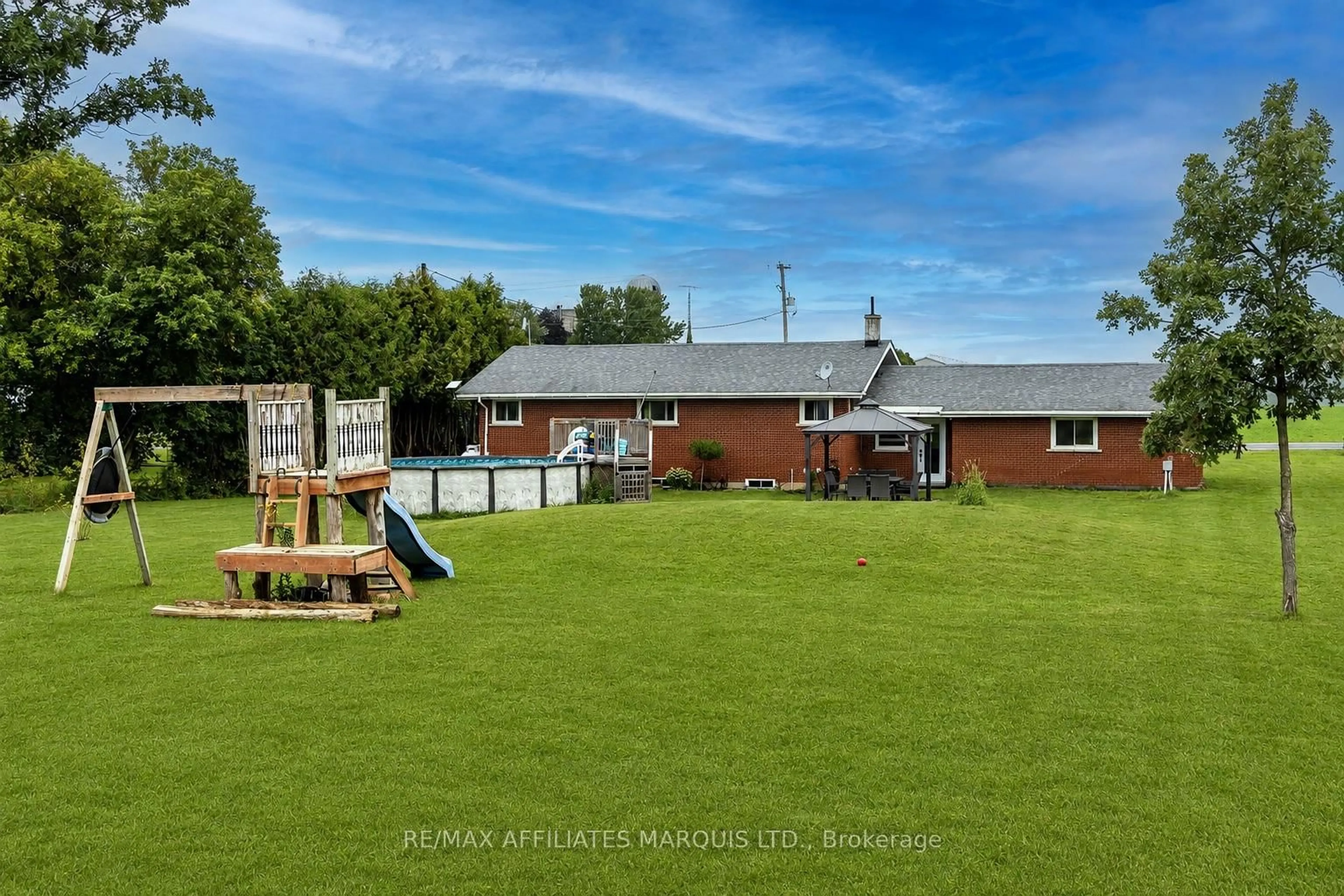 A pic from outside/outdoor area/front of a property/back of a property/a pic from drone, mountain view for 12662 County Road 18 Rd, South Dundas Ontario K0C 2H0