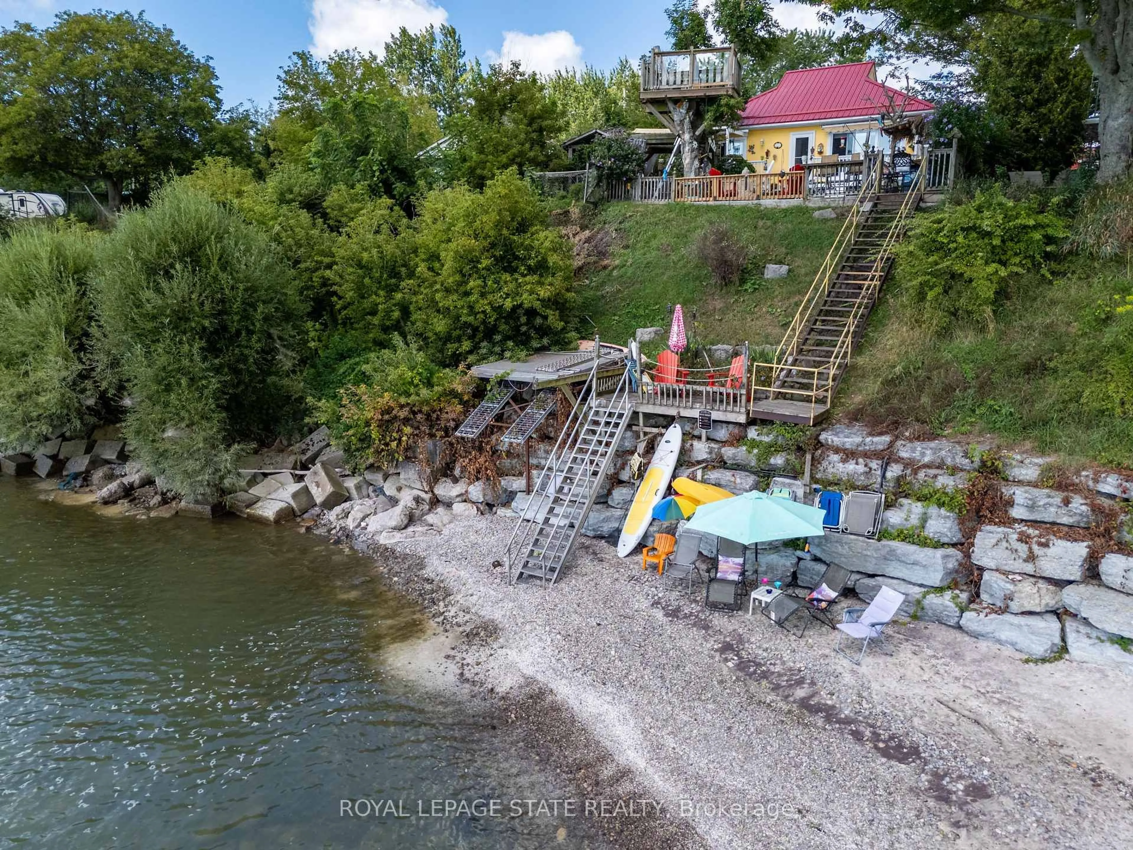 A pic from outside/outdoor area/front of a property/back of a property/a pic from drone, water/lake/river/ocean view for 23 Nature Line, Haldimand Ontario N0A 1K0