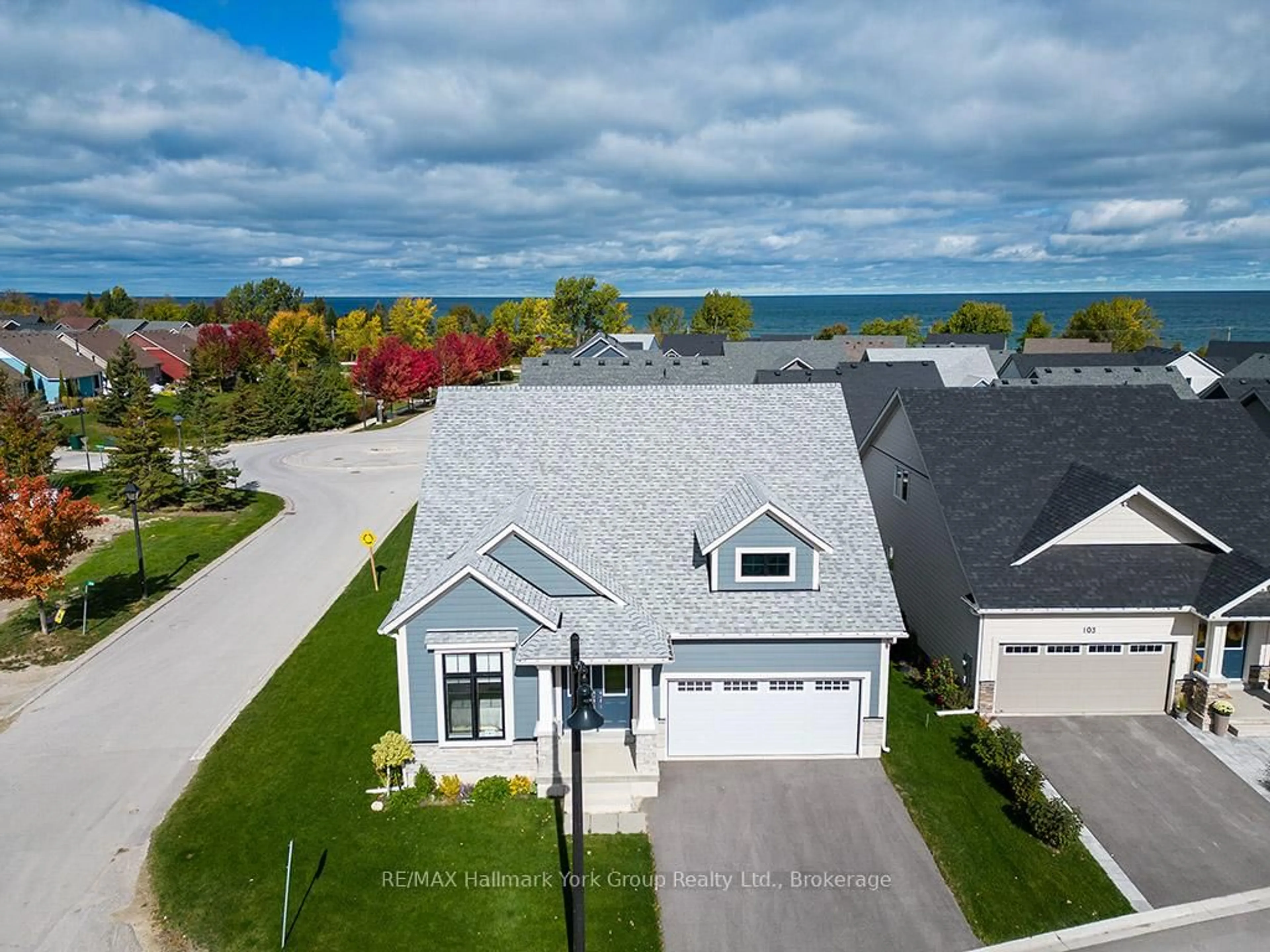 A pic from outside/outdoor area/front of a property/back of a property/a pic from drone, water/lake/river/ocean view for 101 Clippers Lane, Blue Mountains Ontario N0H 2P0
