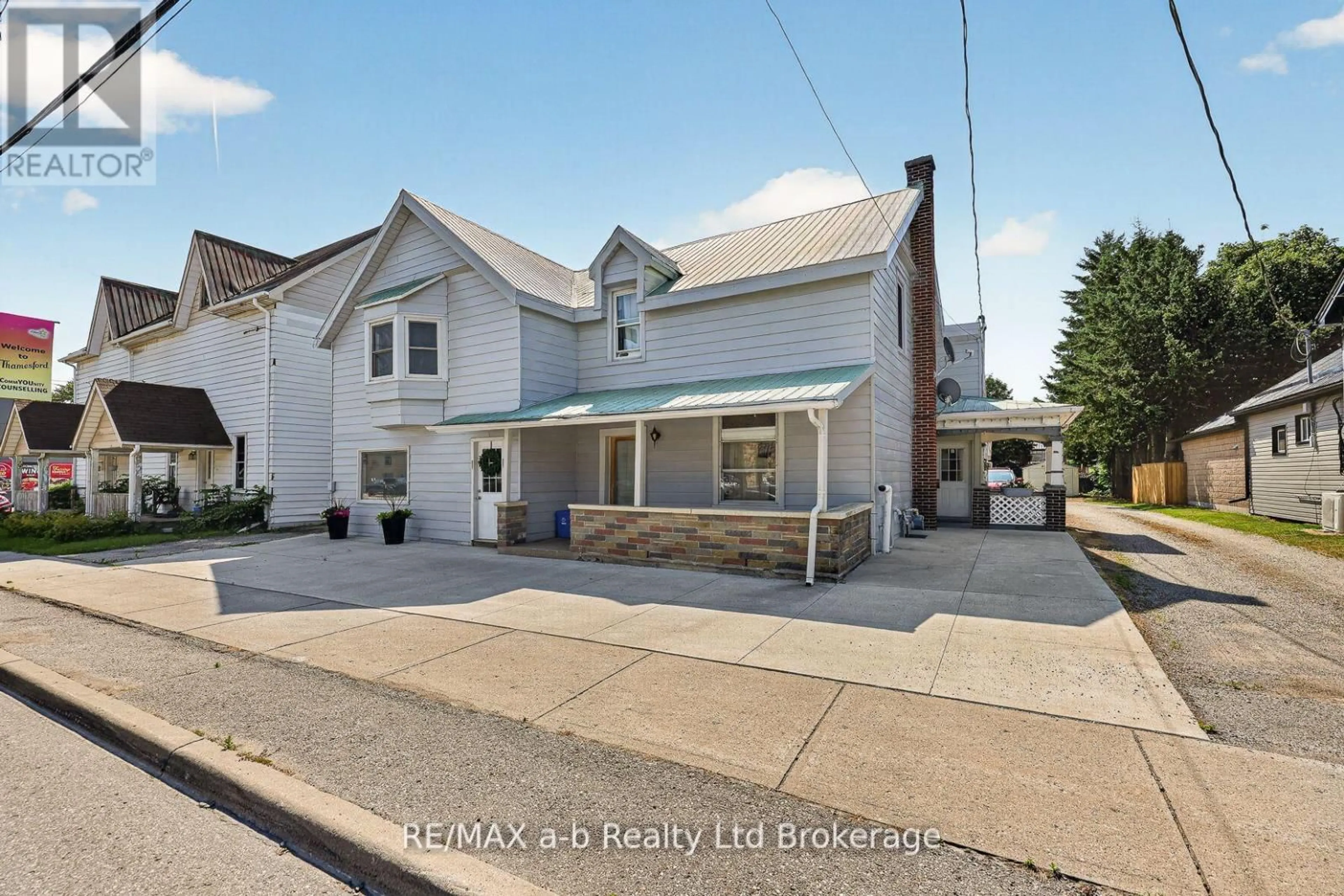 A pic from outside/outdoor area/front of a property/back of a property/a pic from drone, street for 133 Dundas St, Zorra Ontario N0M 2M0
