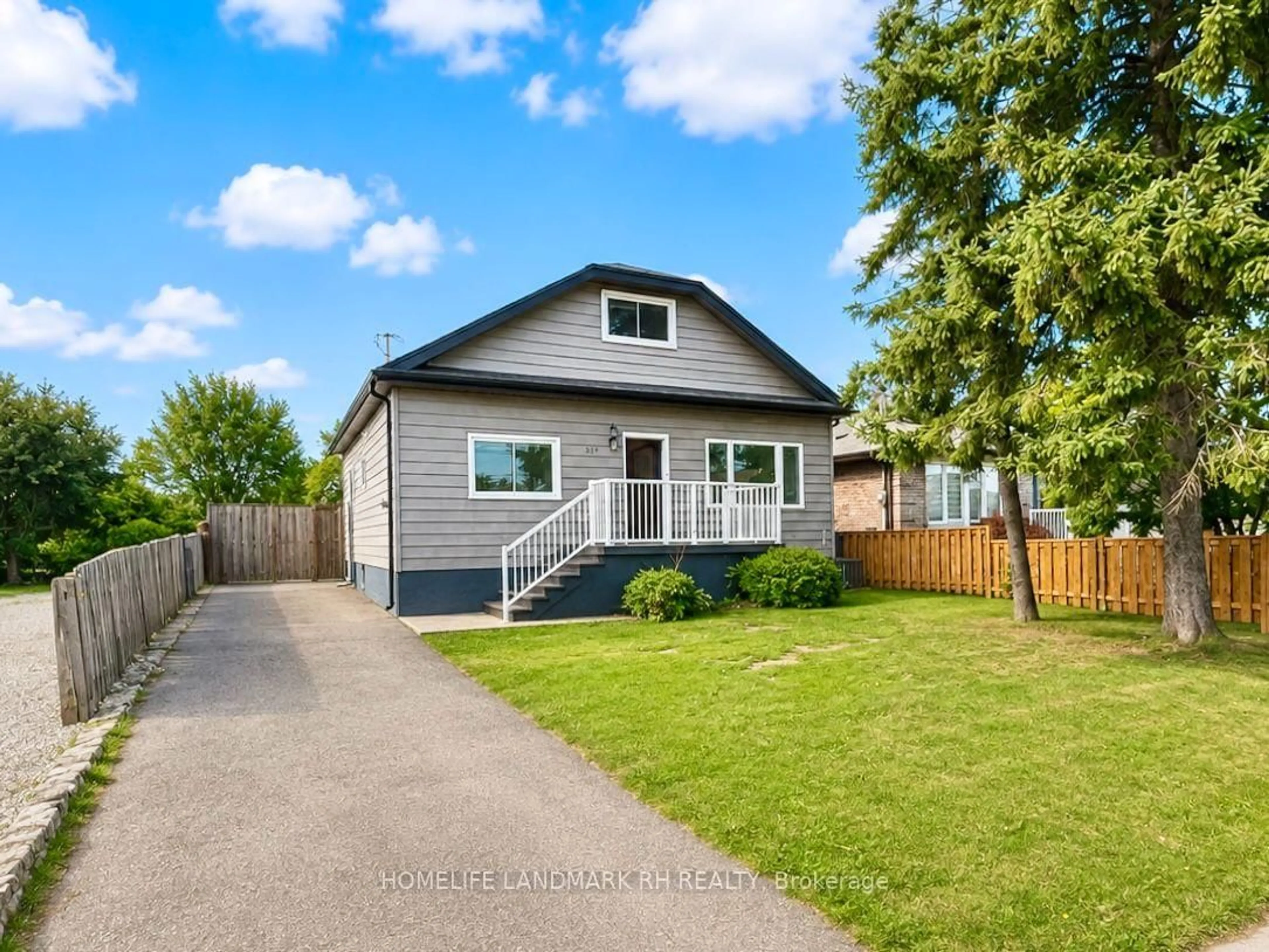 Home with vinyl exterior material, street for 217 Limeridge Rd, Hamilton Ontario L9C 2V4